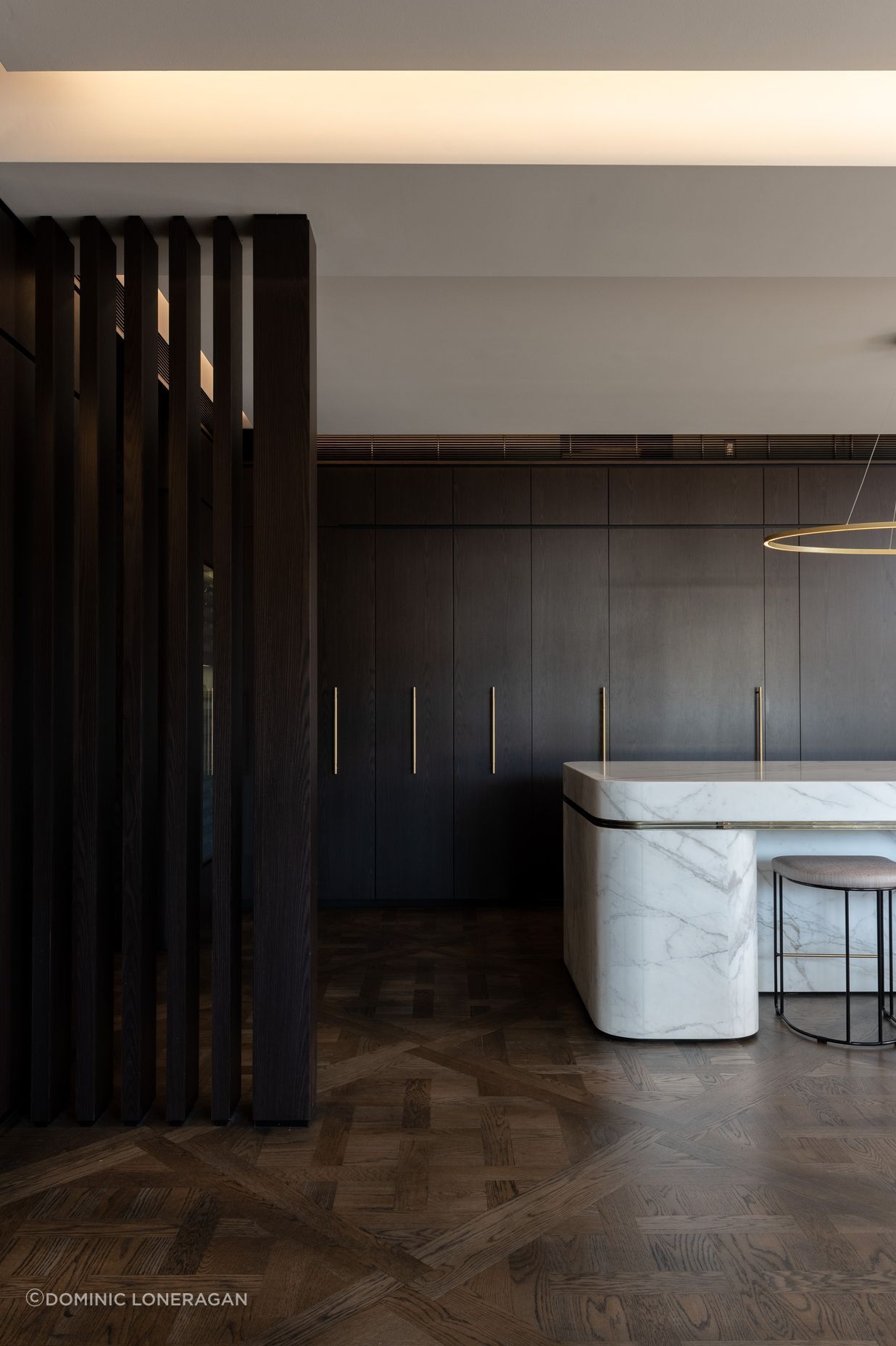 Bespoke joinery and a curved marble bench