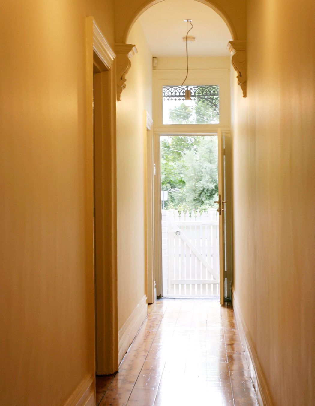 Hallway, looking outside to front view