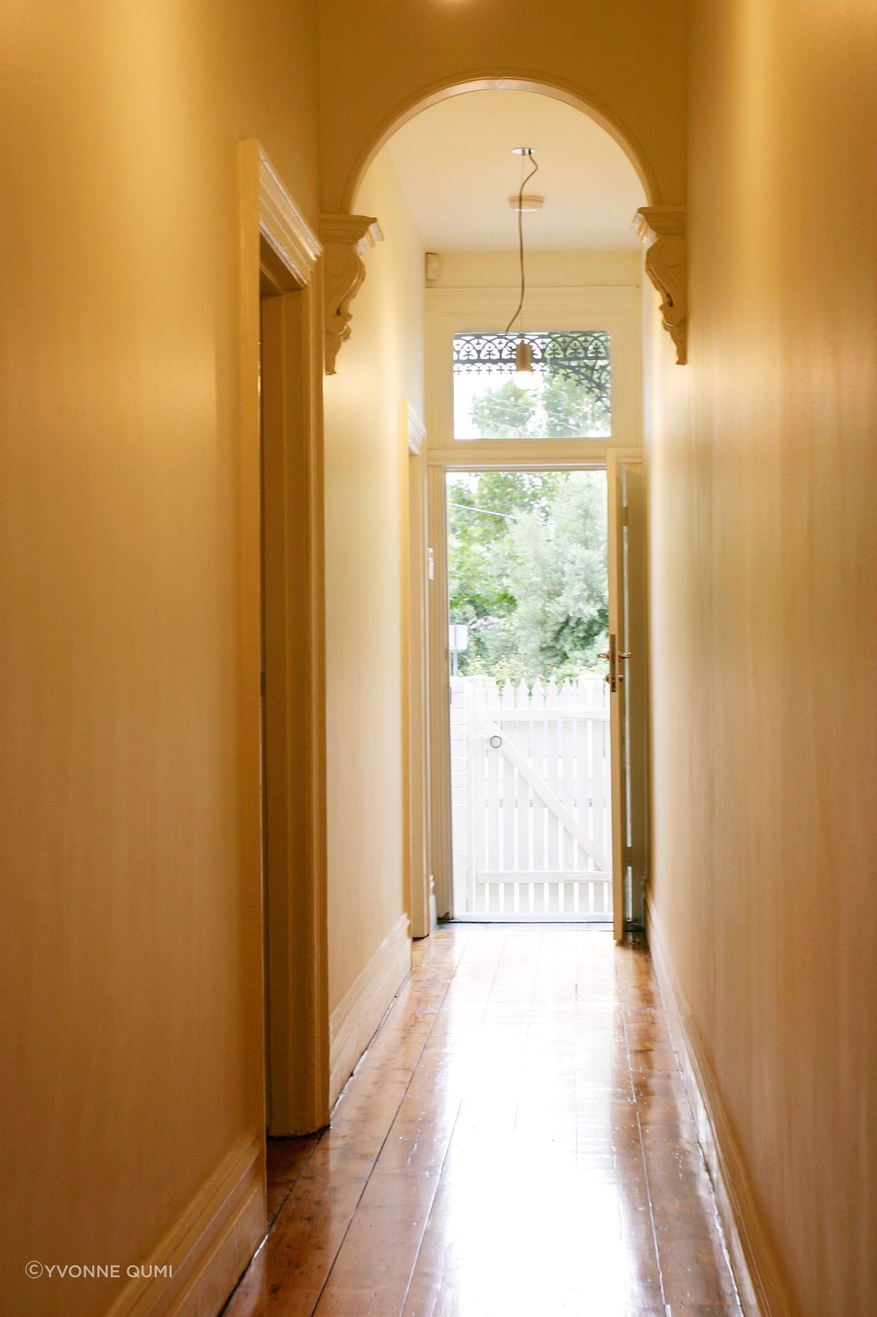 Hallway, looking outside to front view