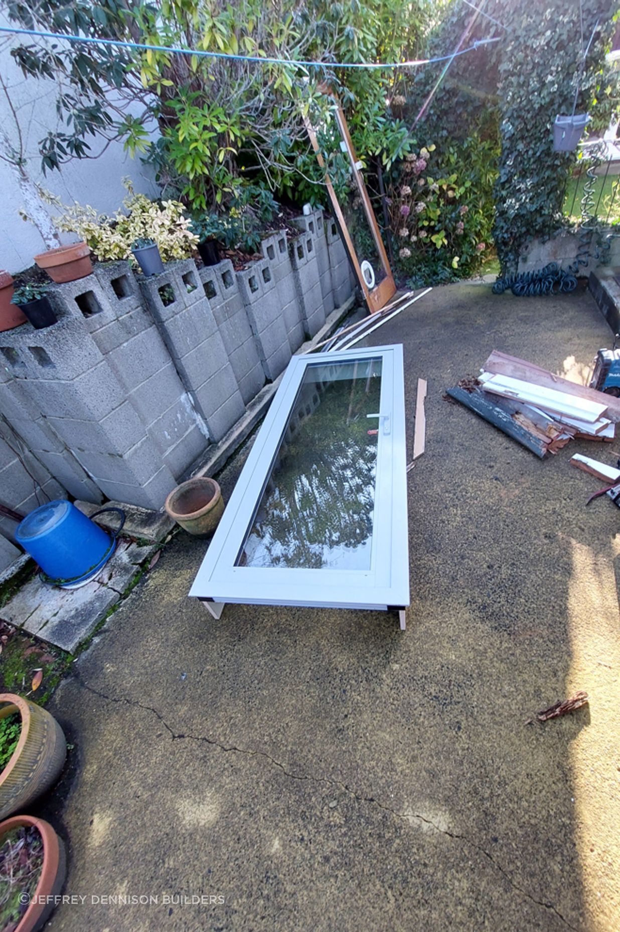 12-19-Tweed-St-Roslyn-Dunedin-New-double-glazed-door-being-readied-for-installation-JDBuilders.jpg