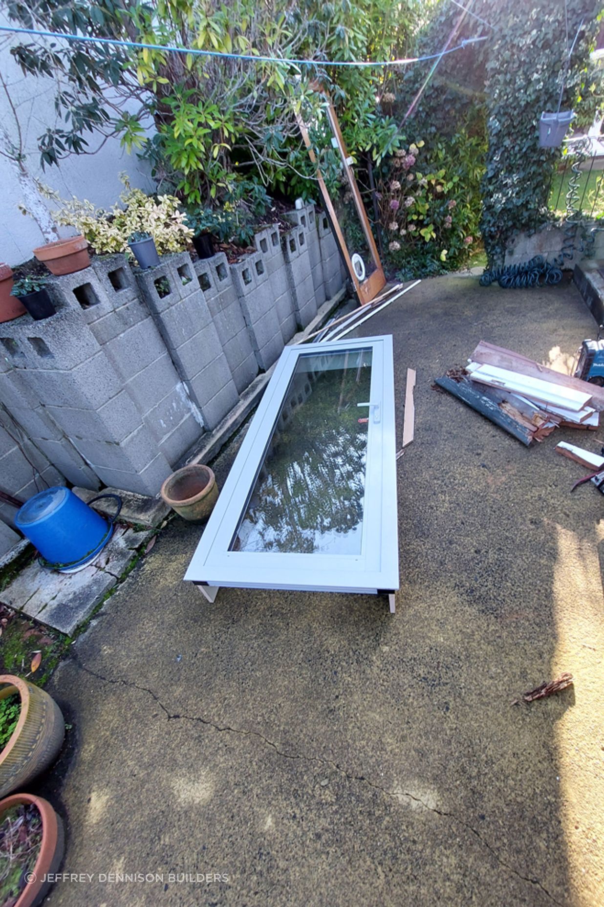 12-19-Tweed-St-Roslyn-Dunedin-New-double-glazed-door-being-readied-for-installation-JDBuilders.jpg