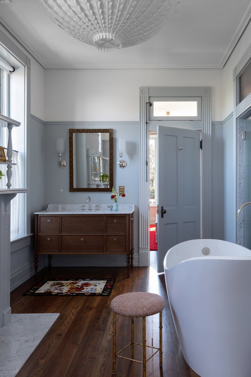 12PastandPresentPlaceCuppettKilpatrickArchitectureandInteriorDesignAustinTexashistoric-bathroom-transom-moulding-furniture-vanity-freestanding-tub-fireplace.jpg