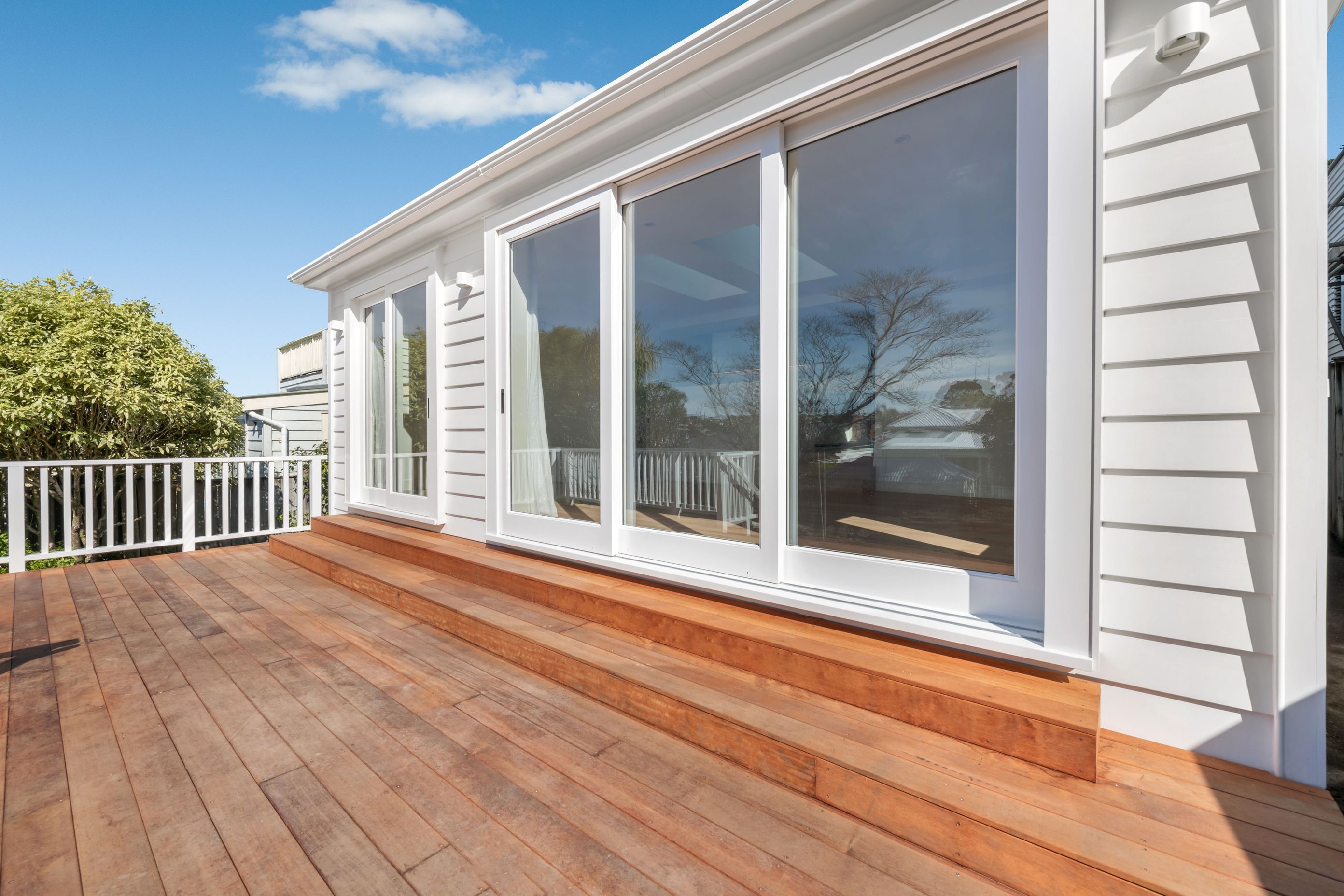 Heritage outside, modern comfort inside. This build brought together flush-entry showers, tiled bathrooms, solid oak floors, and timber joinery that blends with the original.