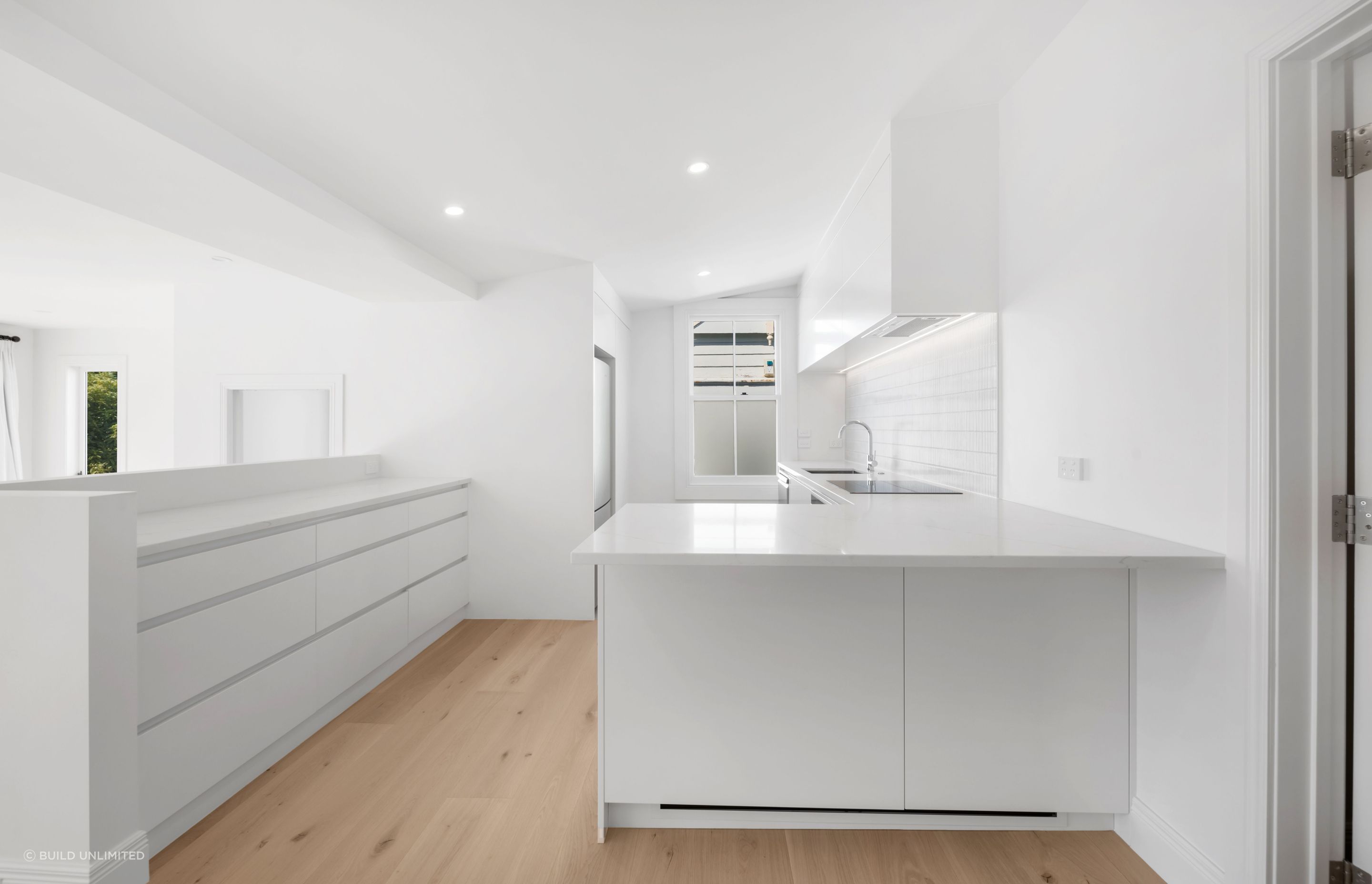 We didn’t build new, we built better. Kept the bones, modernised the flow, and created a space that feels connected from front door to back deck.