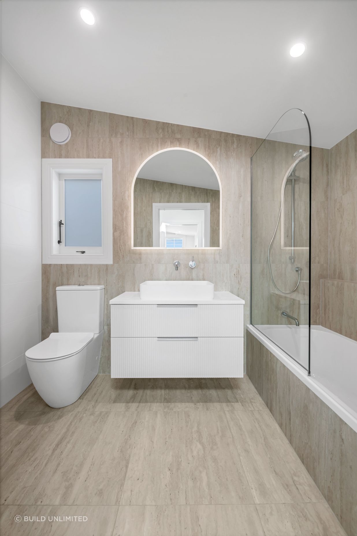 Doesn’t scream for attention, just feels right. Simple lines, warm tones, and tapware that does the job without fuss.
