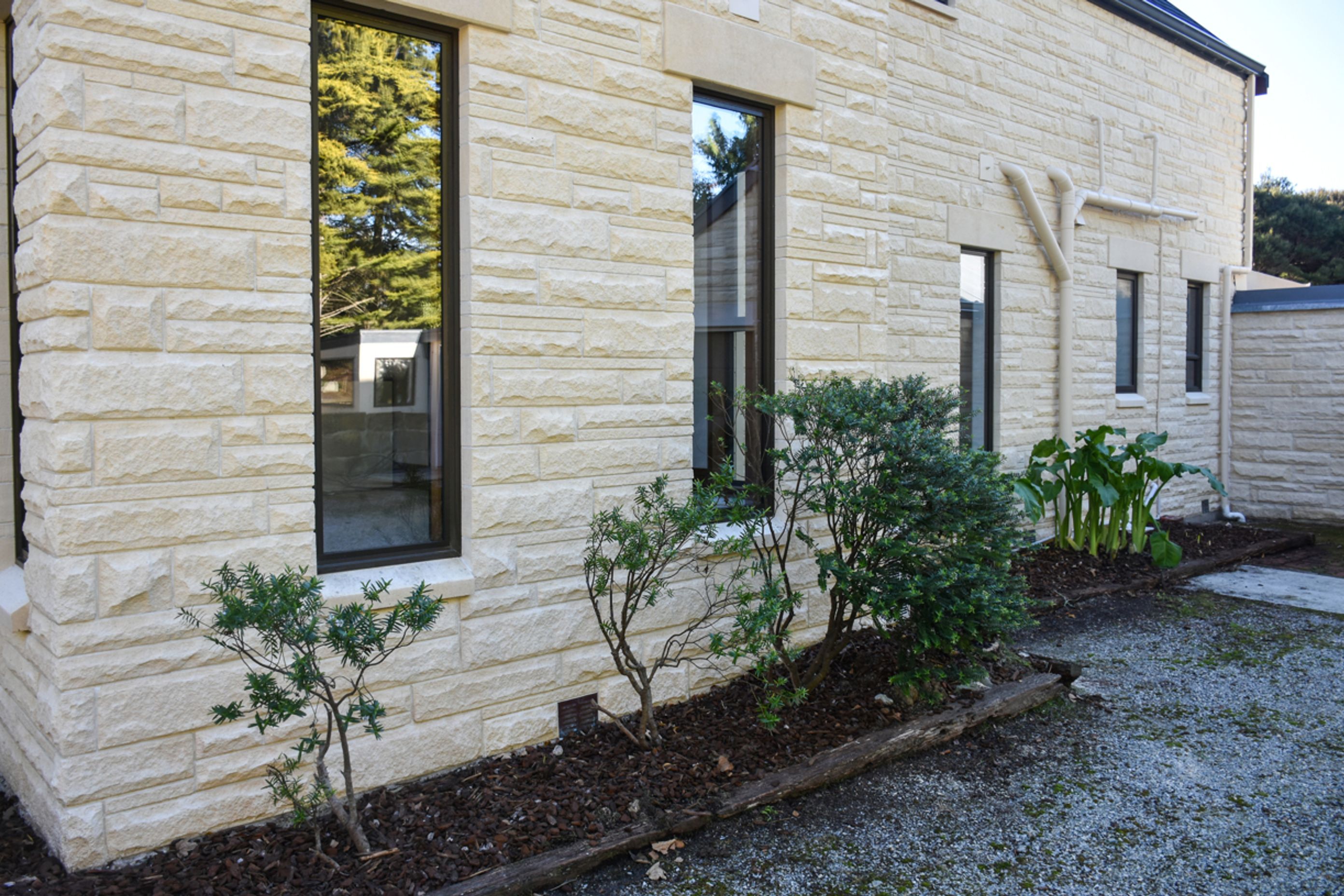 Cleaned/Restored Oamaru stone work and new double-glazed windows- courtyard