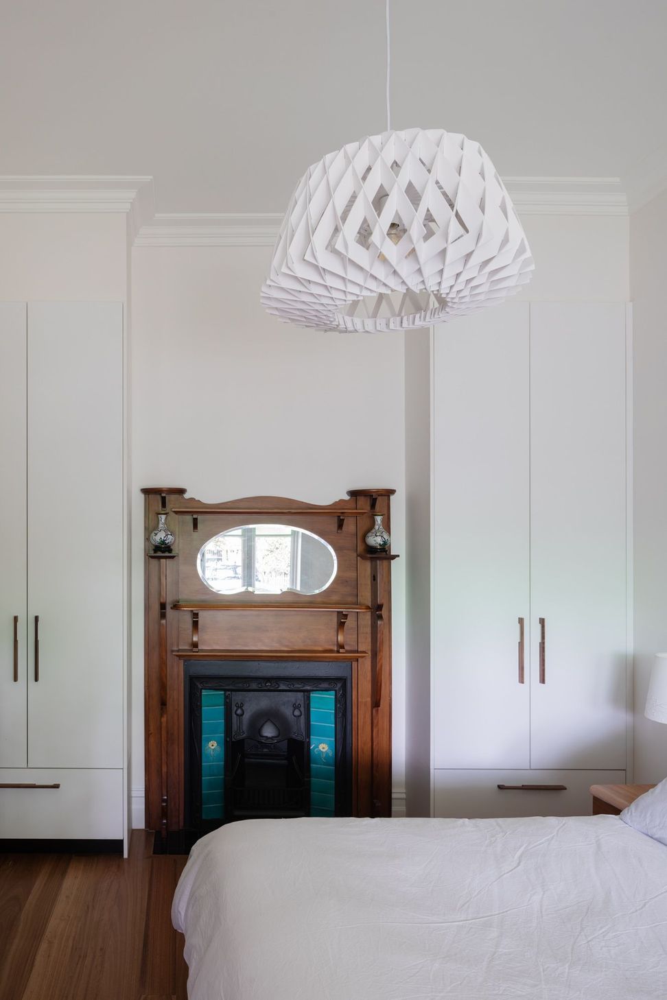 Heritage fireplace feature in bedroom