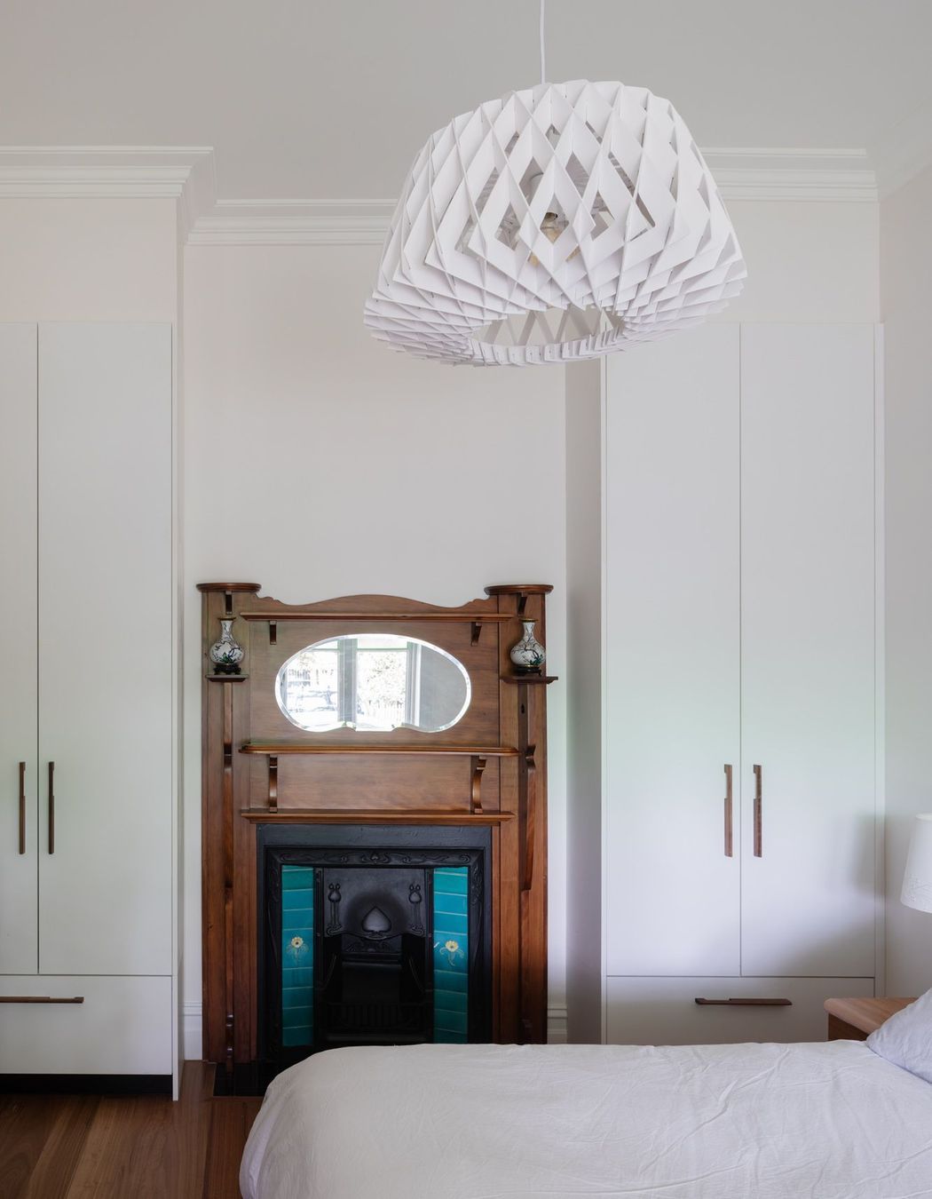 Heritage fireplace feature in bedroom