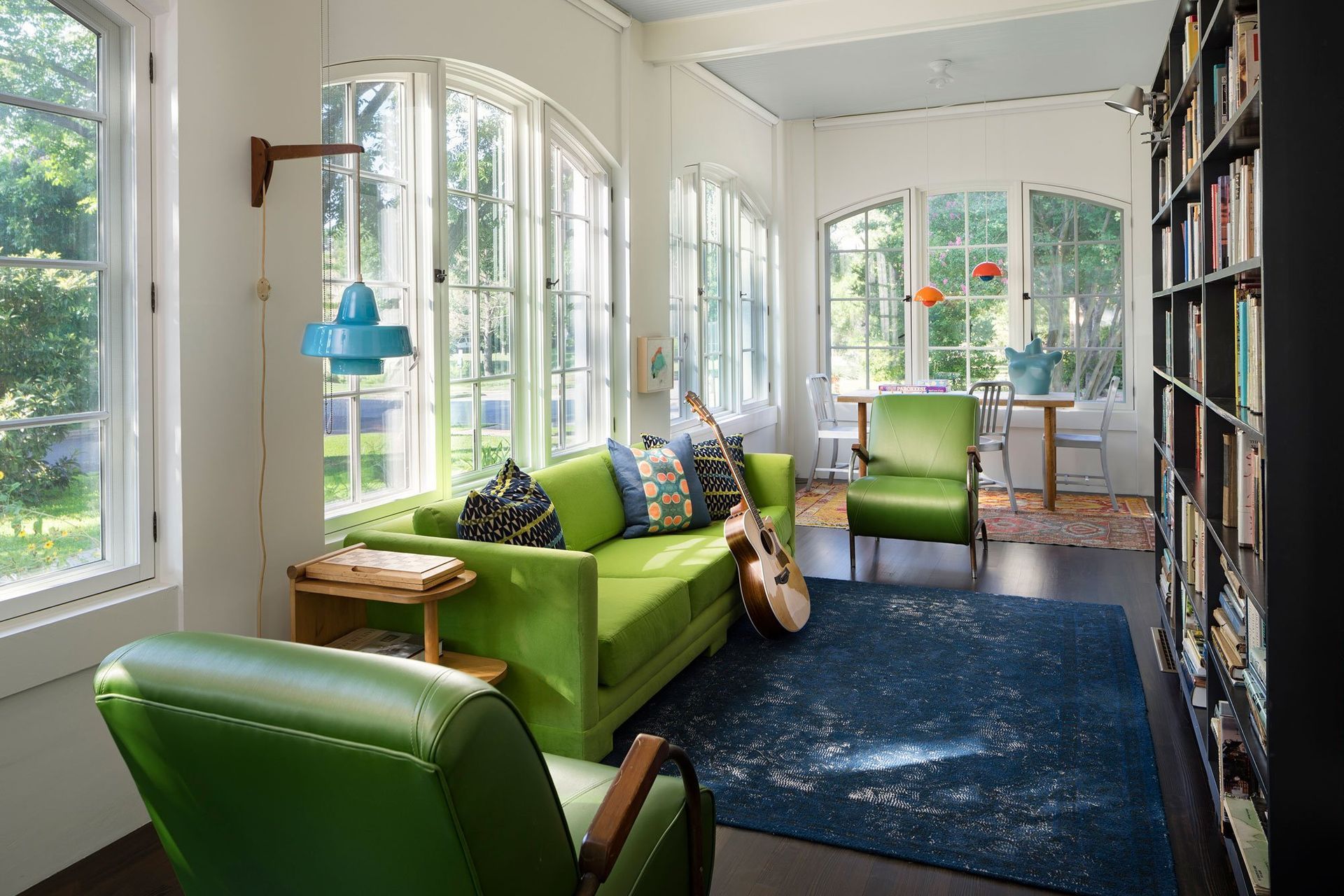 17TransformationinHemphillParkCuppettKilpatrickArchitectureandInteriorDesignaustin-tx-sunroom-bright-green-furniture-natural-light.jpg