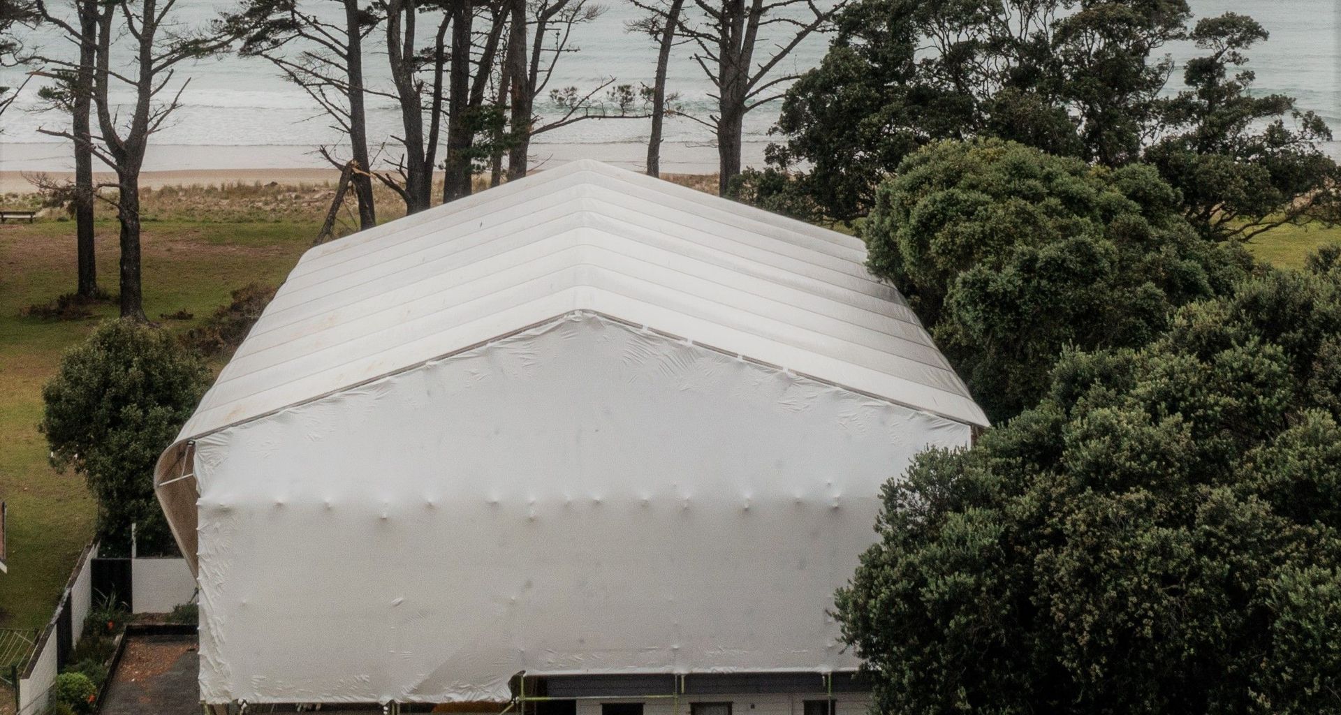 "It's A Wrap"                                Shrink-Wrap & Layher Keder (PVC Sheet Tarpaulin) Roof System banner