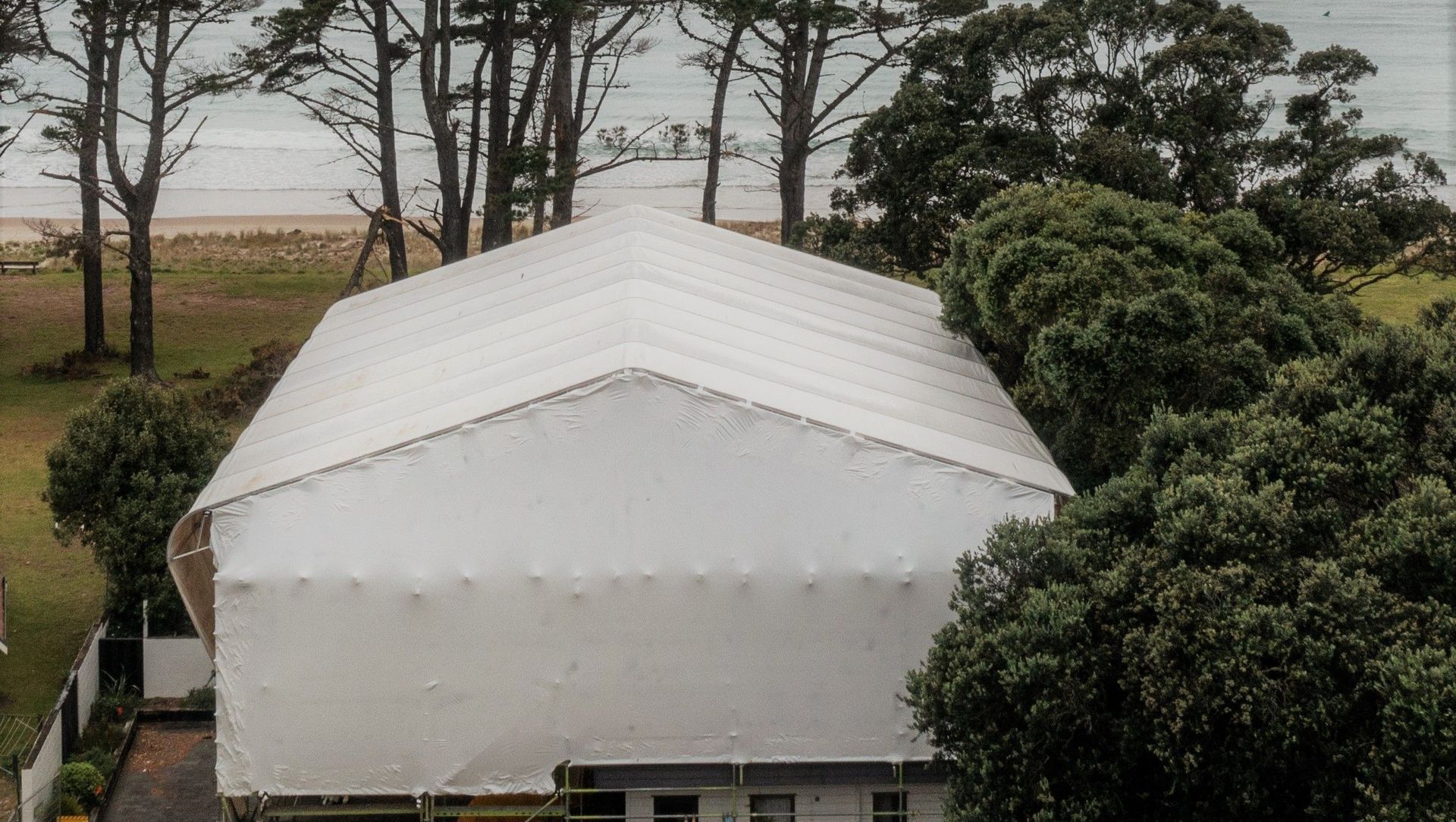 "It's A Wrap"                                Shrink-Wrap & Layher Keder (PVC Sheet Tarpaulin) Roof System banner