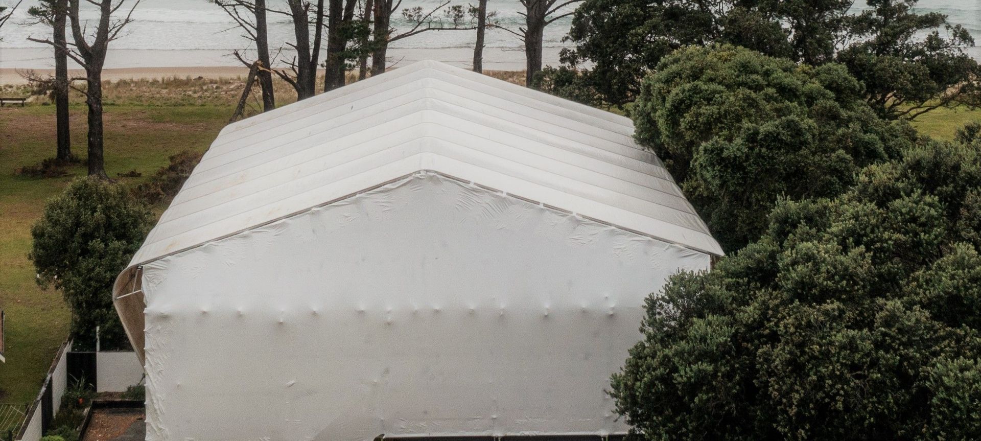 "It's A Wrap"                                Shrink-Wrap & Layher Keder (PVC Sheet Tarpaulin) Roof System banner