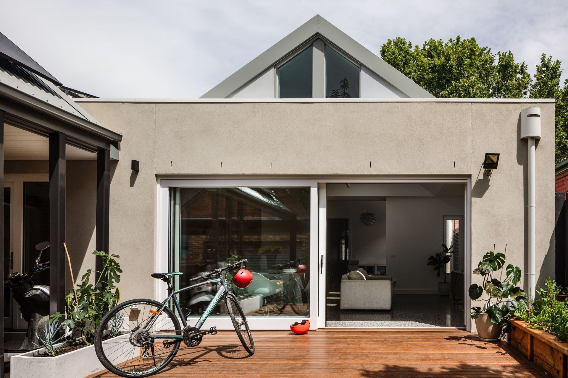 External view of living room with double glazed sliding doors