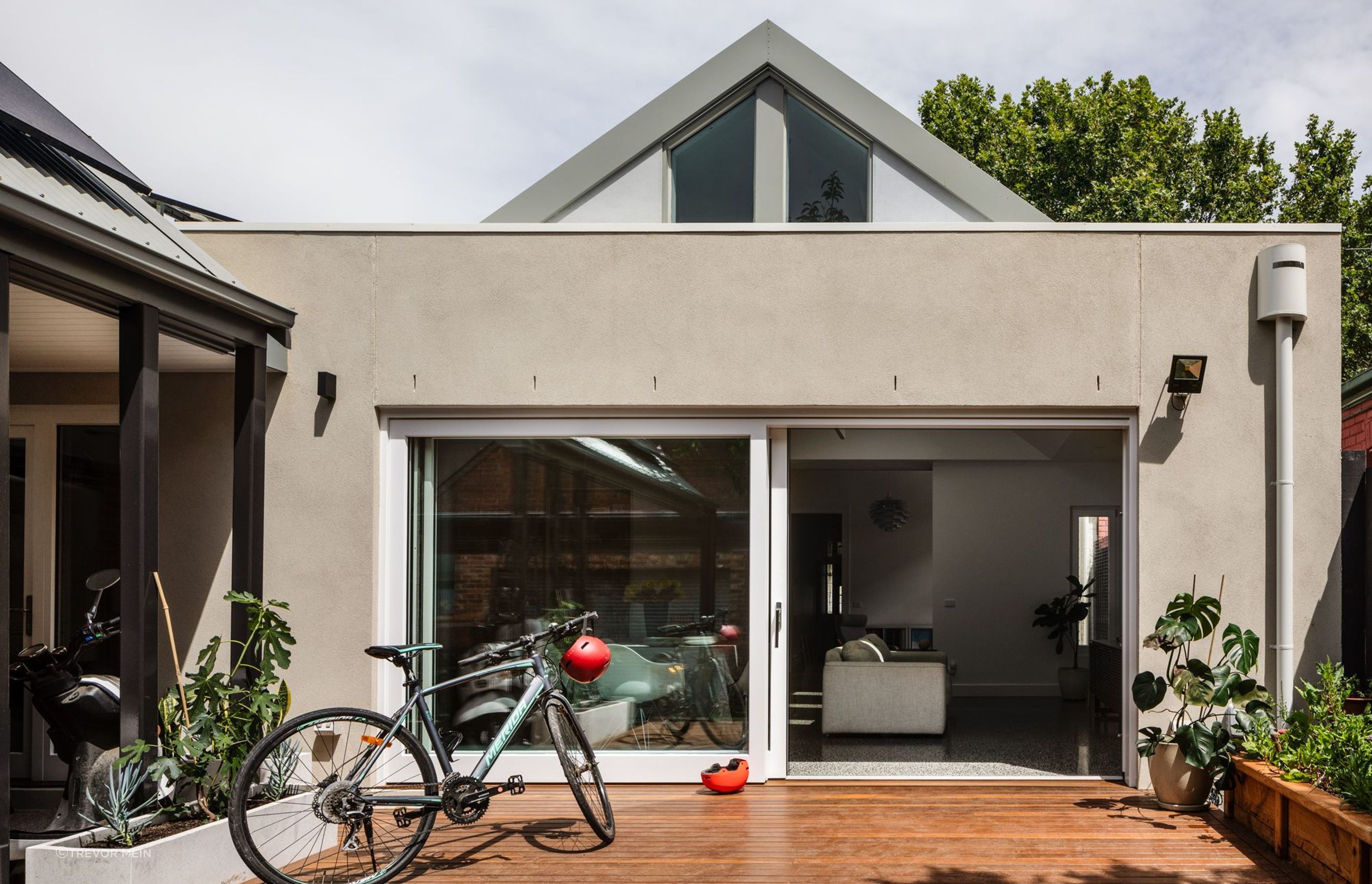 External view of living room with double glazed sliding doors