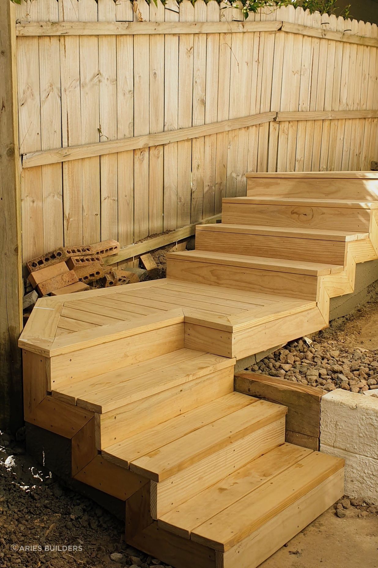 Pine decking stairs by Aries builders