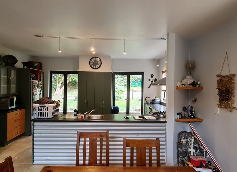 Contemporary Kitchen and Bathroom Renovation with Rustic Features