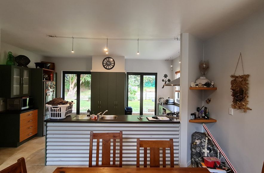 Contemporary Kitchen and Bathroom Renovation with Rustic Features