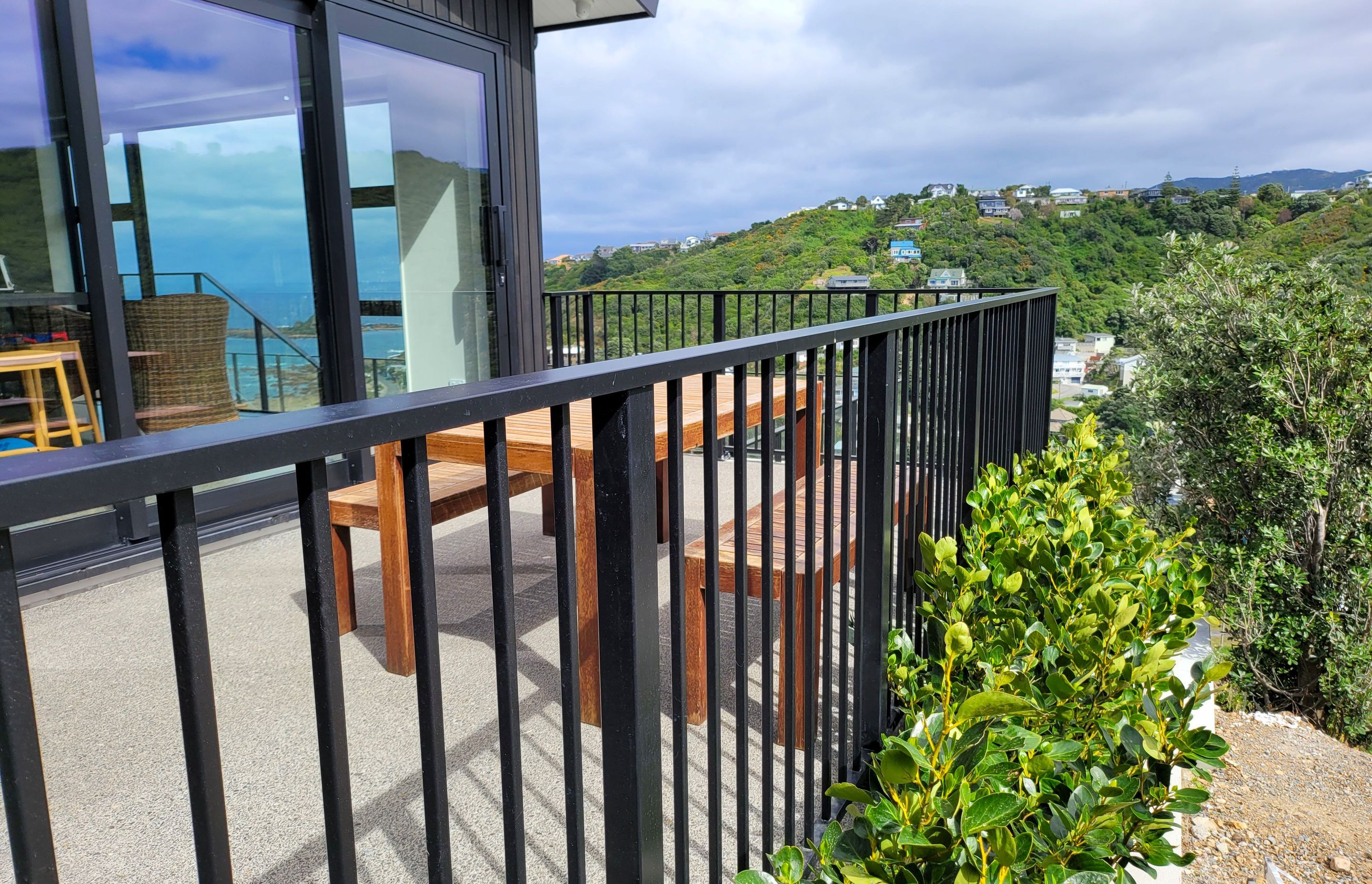 A UNEX glass balustrade to enhance the impressive see views of this Wellington residence