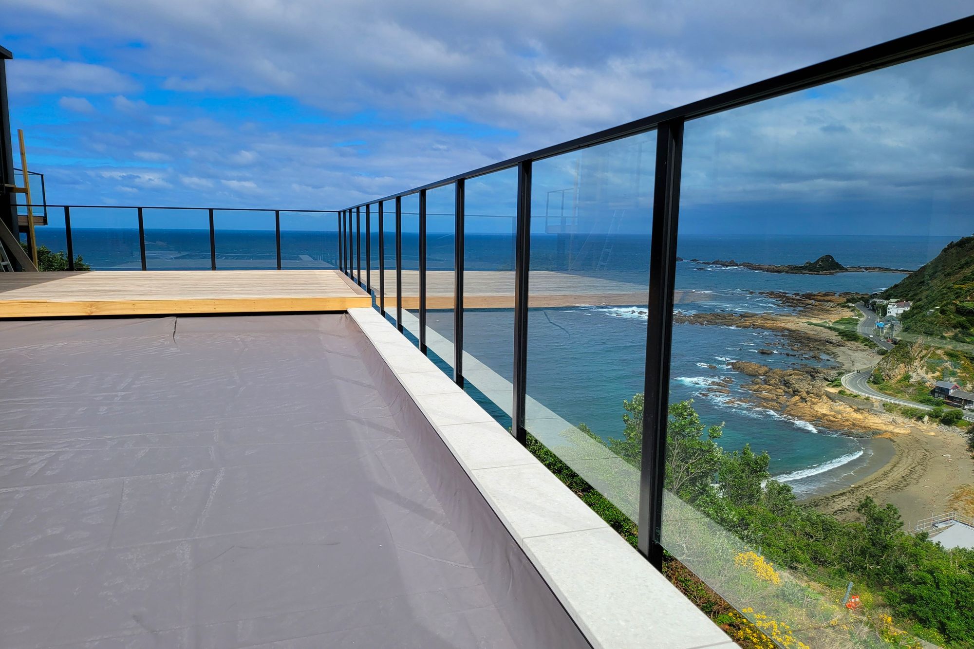 A UNEX glass balustrade to enhance the impressive see views of this Wellington residence