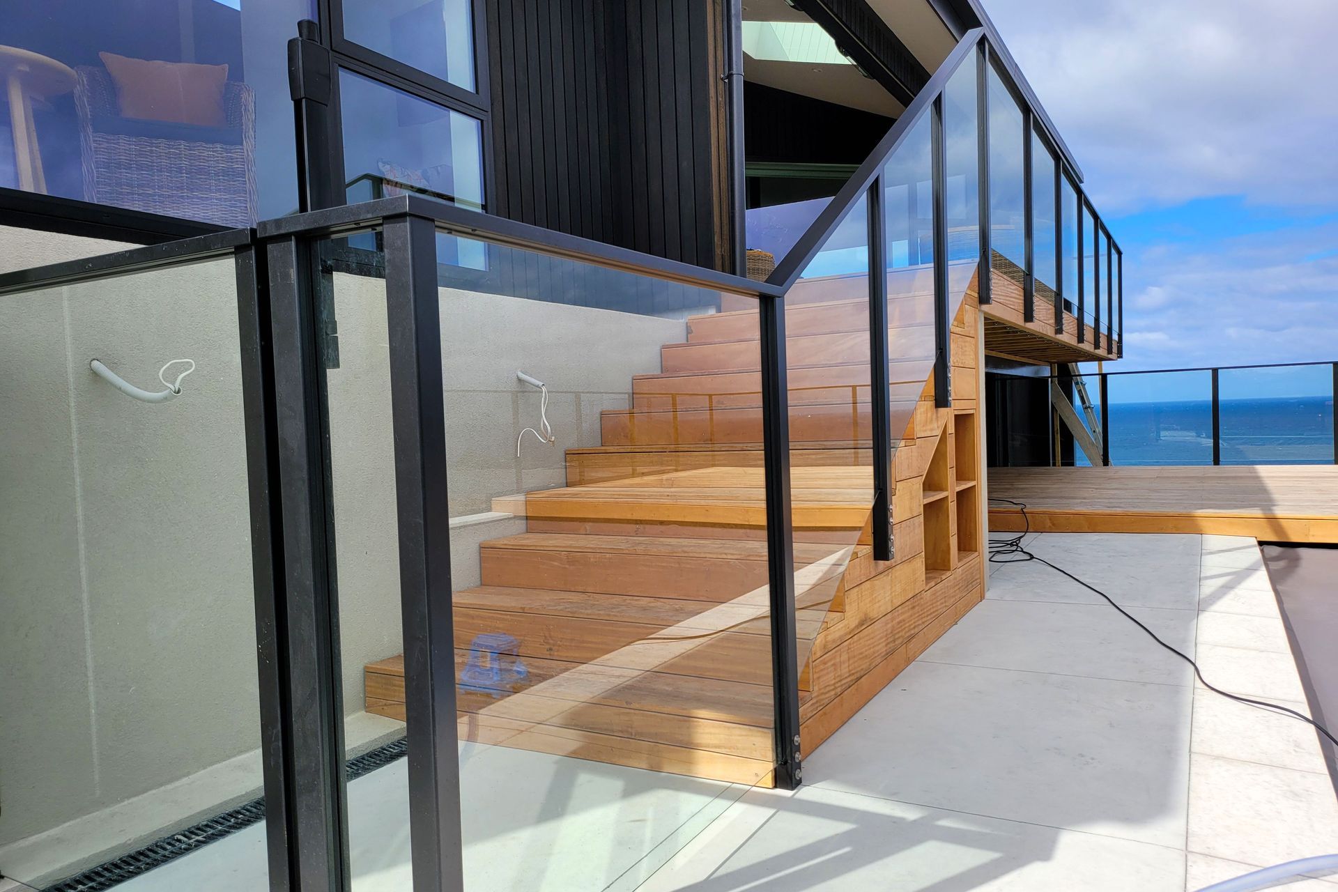 A UNEX glass balustrade to enhance the impressive see views of this Wellington residence