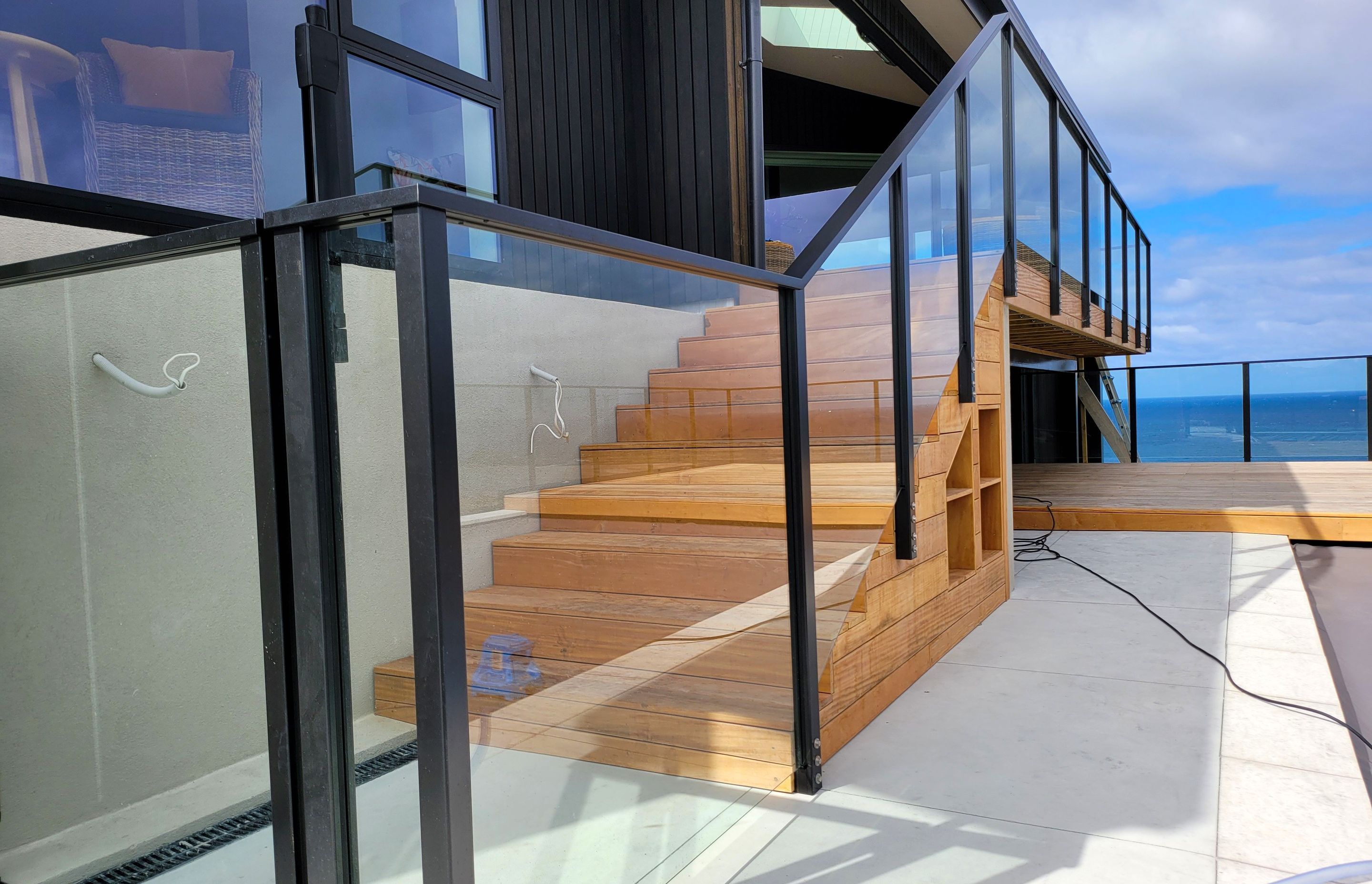 A UNEX glass balustrade to enhance the impressive see views of this Wellington residence