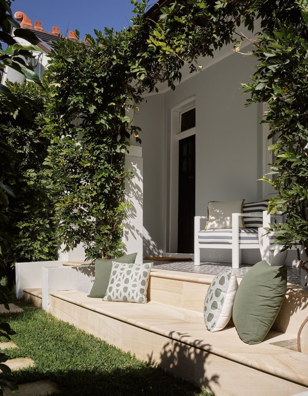 Addition of the stone bench completes the repurpose of the green space on the northern elevation of the dwelling.