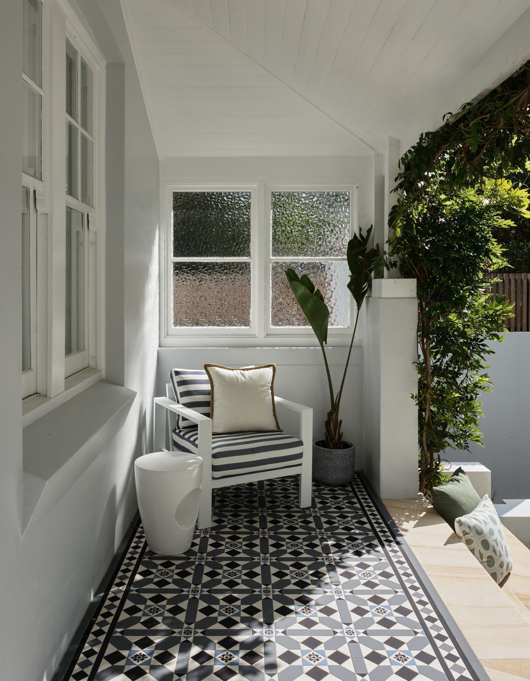 The arctic glass on the north-western corner of the home offers a double duty solution for privacy from the adjacent property and also diffusing the intensity of the afternoon sun for the veranda and bedroom.