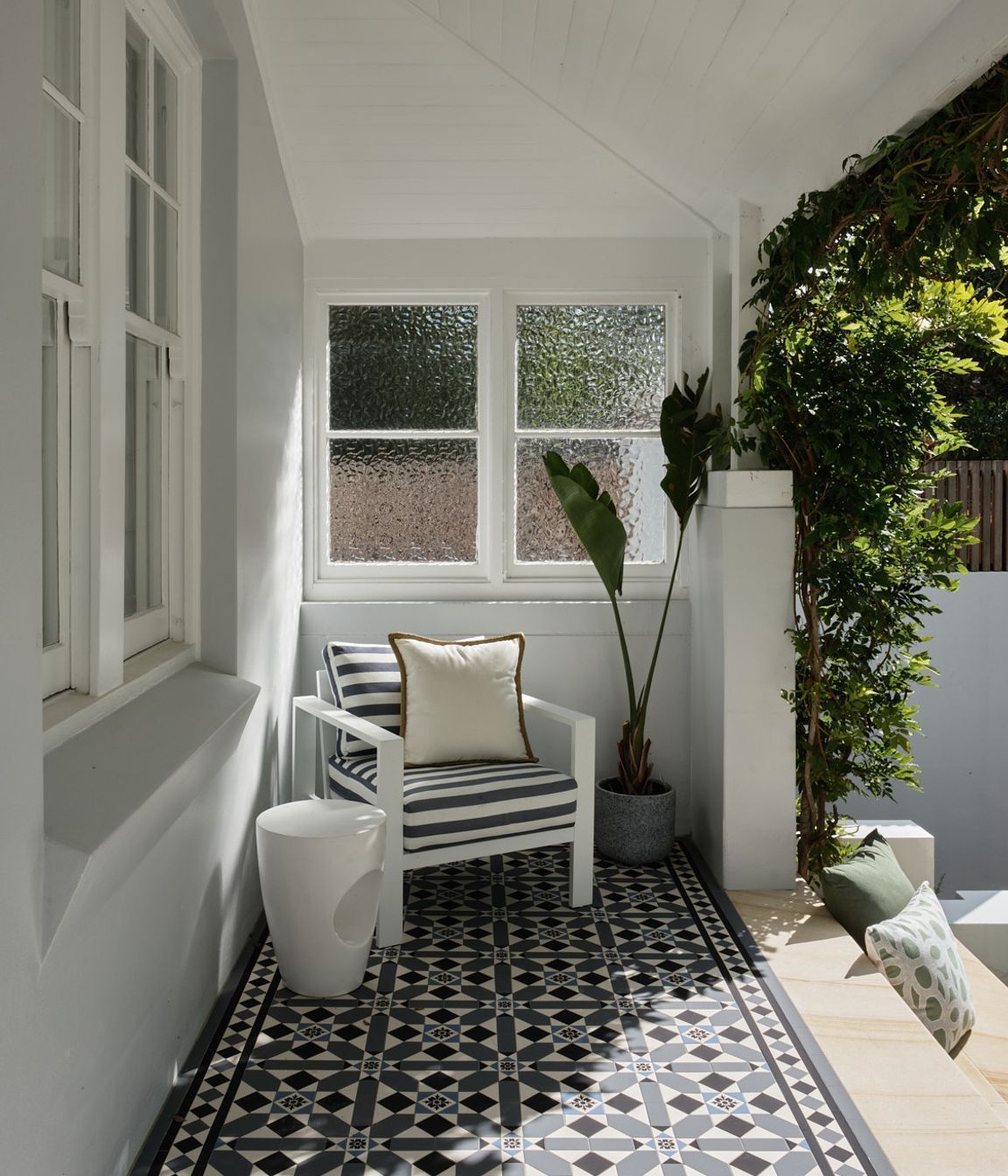 The arctic glass on the north-western corner of the home offers a double duty solution for privacy from the adjacent property and also diffusing the intensity of the afternoon sun for the veranda and bedroom.