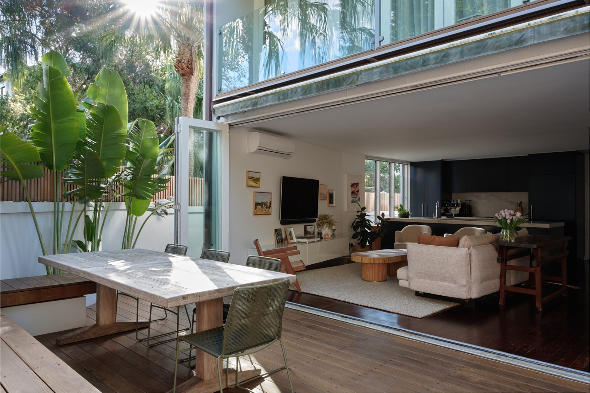 An open plan arrangement between kitchen, living and entertainment spaces, allow for uninterrupted conversations.