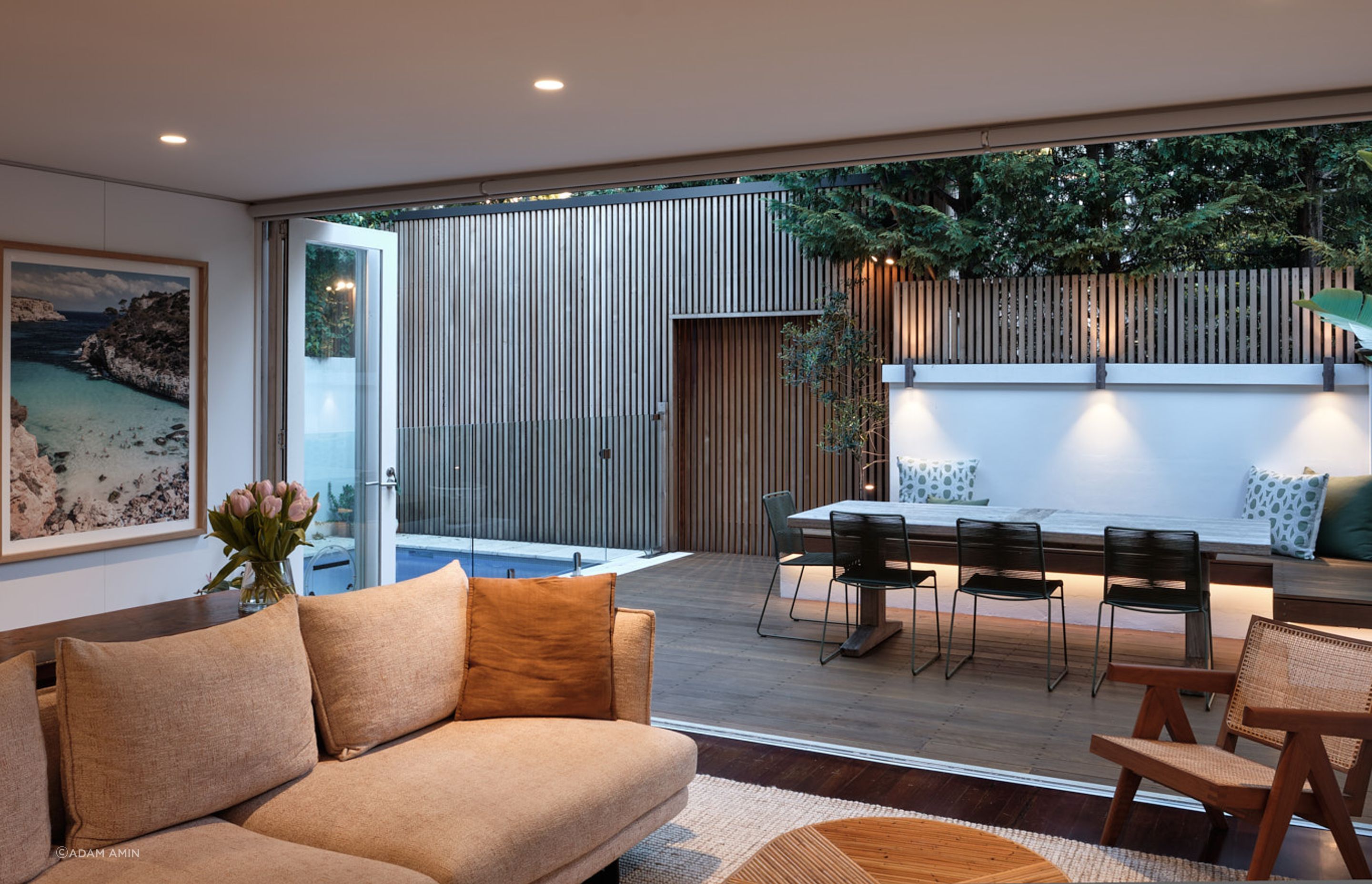 Careful lighting design elevates the mood of the outdoor entertaining area for evening events.