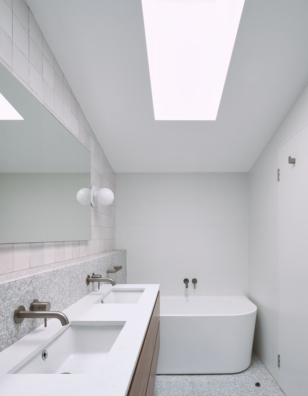 Introducing large skylights into the southern spaces within the home allows for natural light to enter, limiting the dependence on artificial lighting.