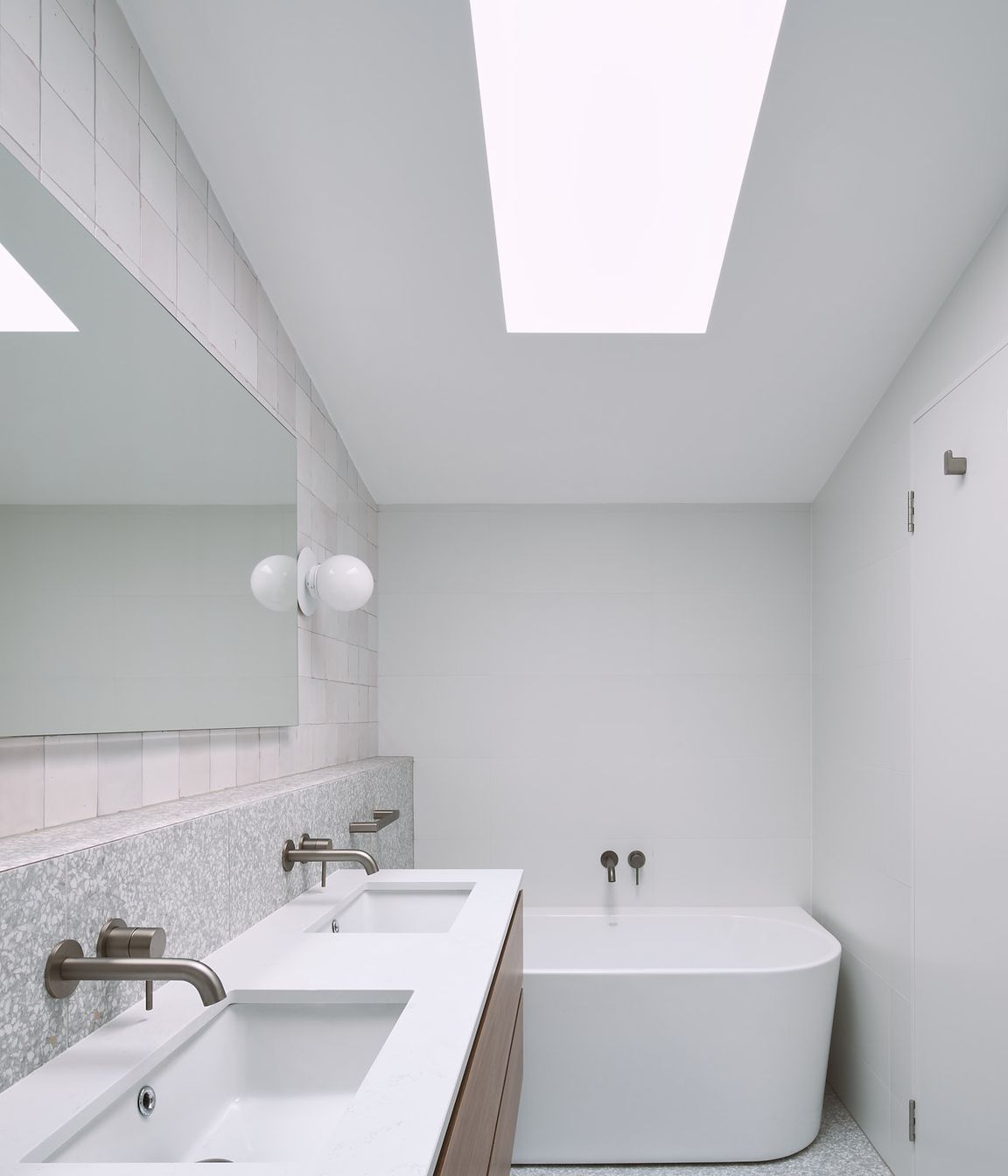 Introducing large skylights into the southern spaces within the home allows for natural light to enter, limiting the dependence on artificial lighting.