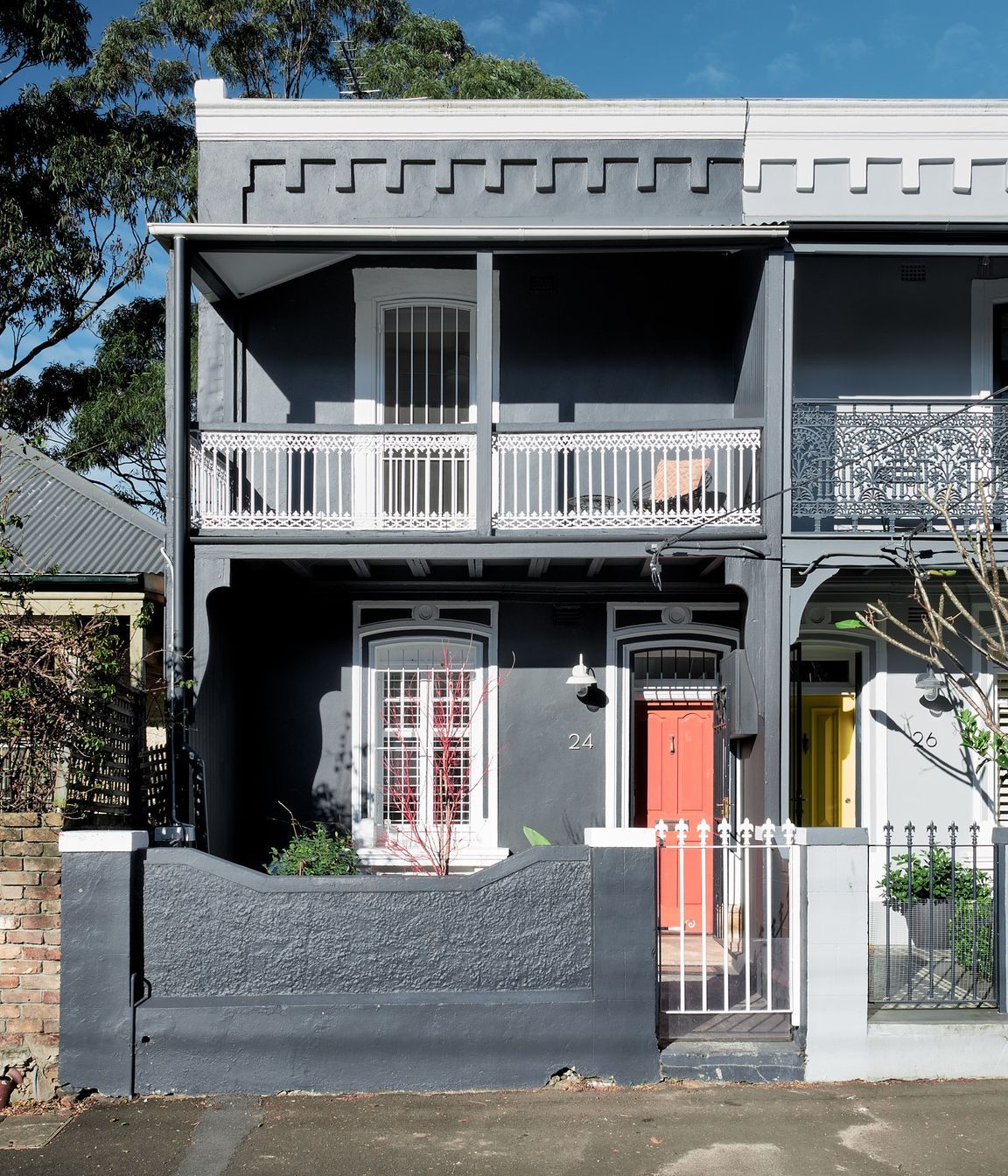 The Victorian terrace frontage, iconic to the streetscape, has been restored with modern hues.