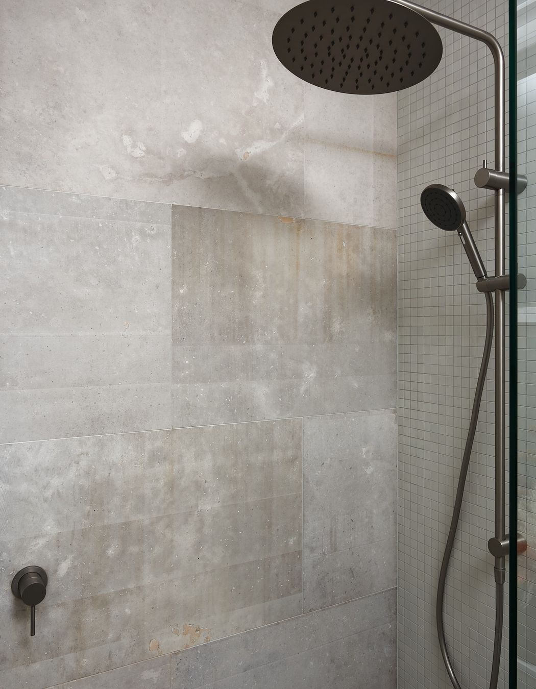 Using a combination of materials similar in tone, however, differs in texture promotes visual interest whilst keeping harmony.