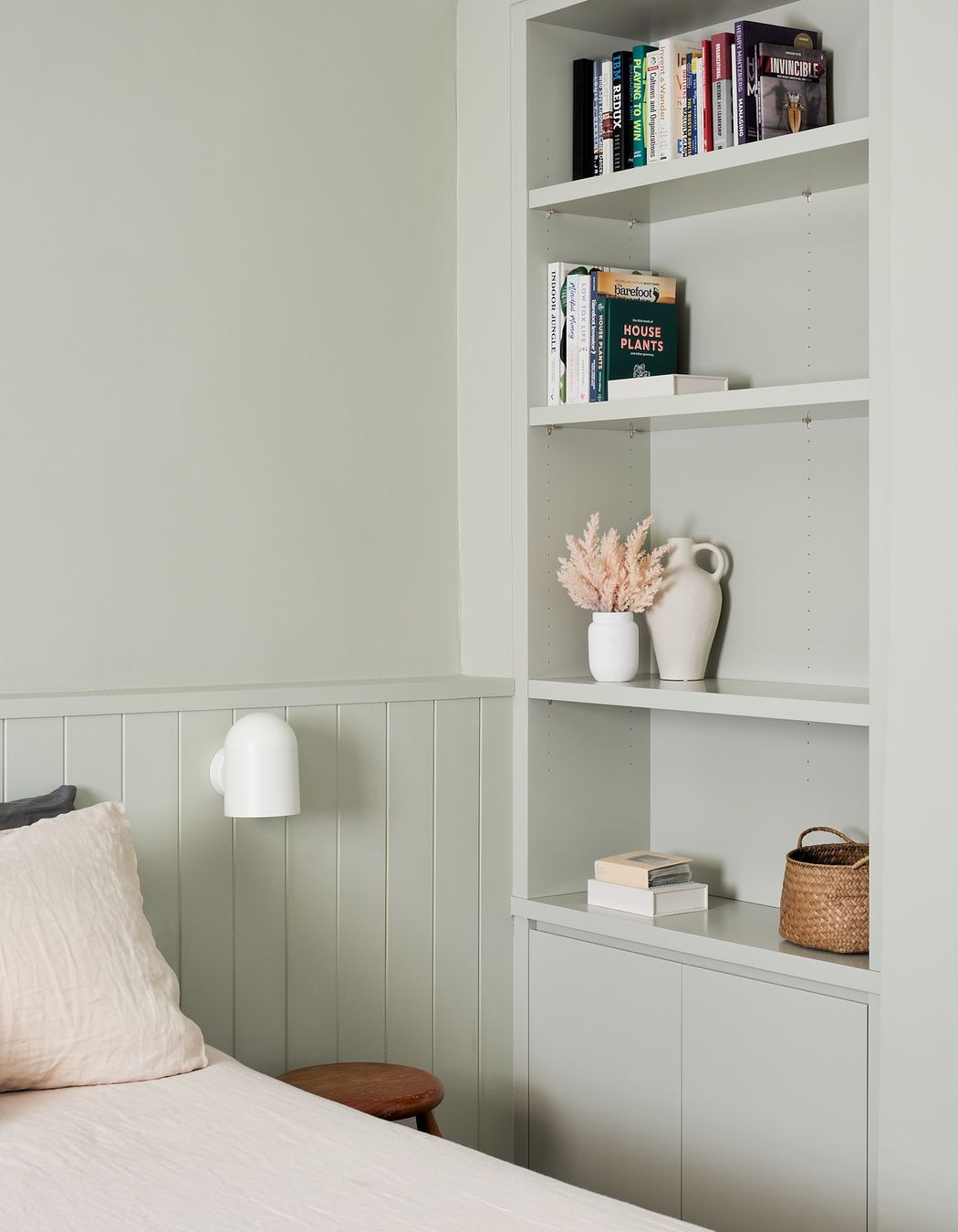 The use of custom joinery is further employed, creating an incidental shelf above the bed as a bedhead and open cabinetry for personalised items.