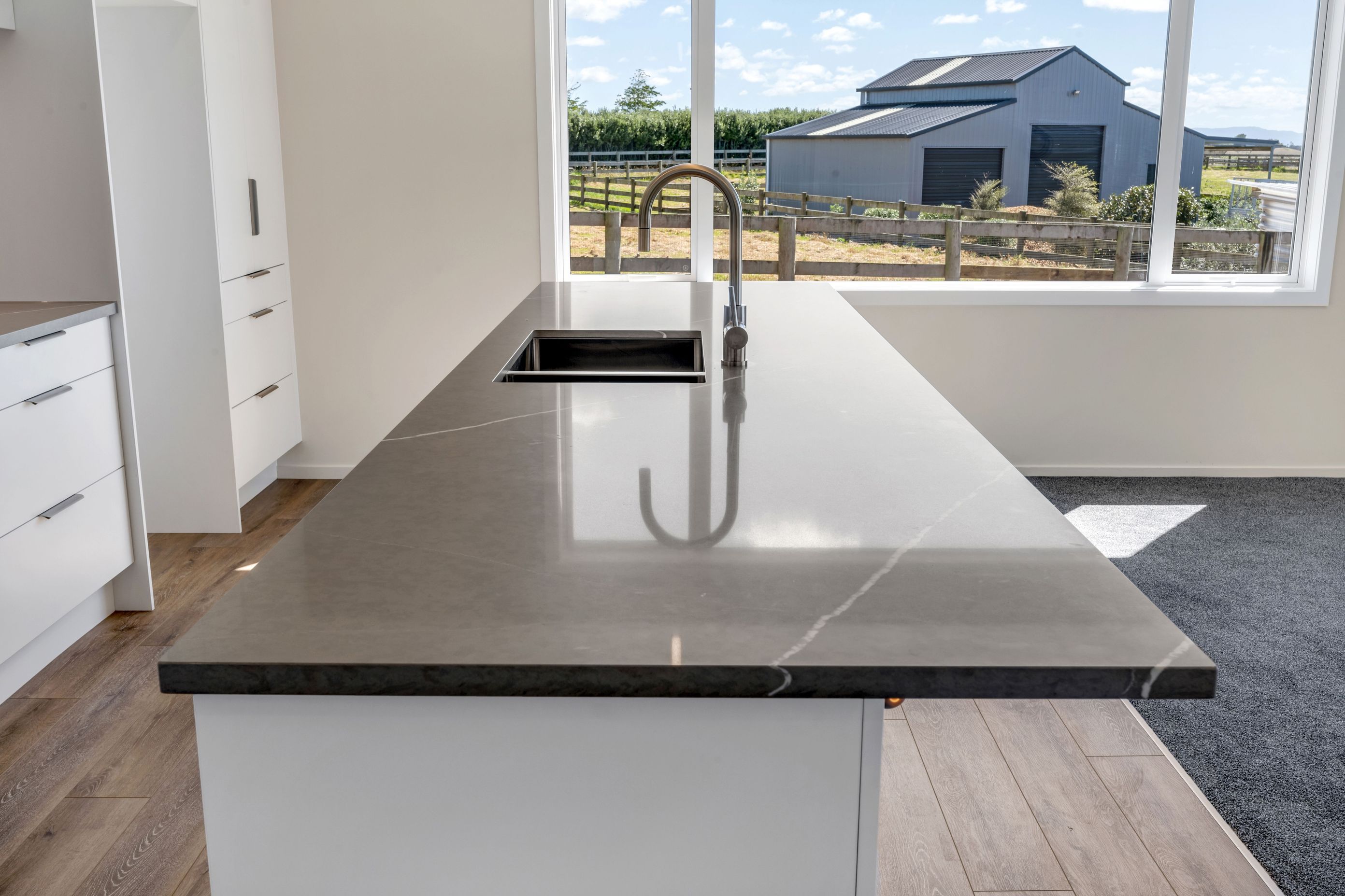 Hidden, practical, and exactly what the client needed to make the space flow better.