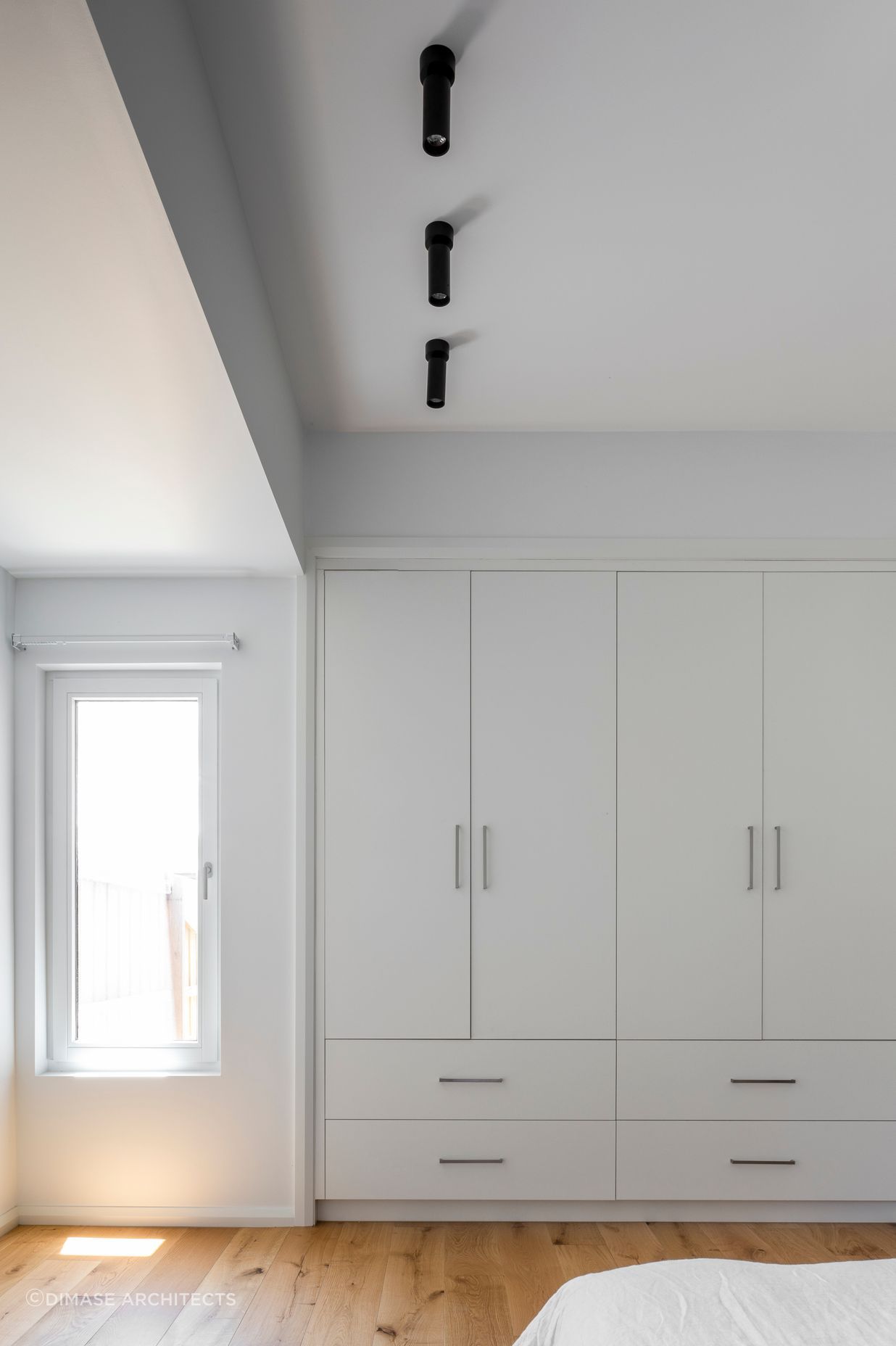 Built in robe and window provide space and light in the upstairs addition