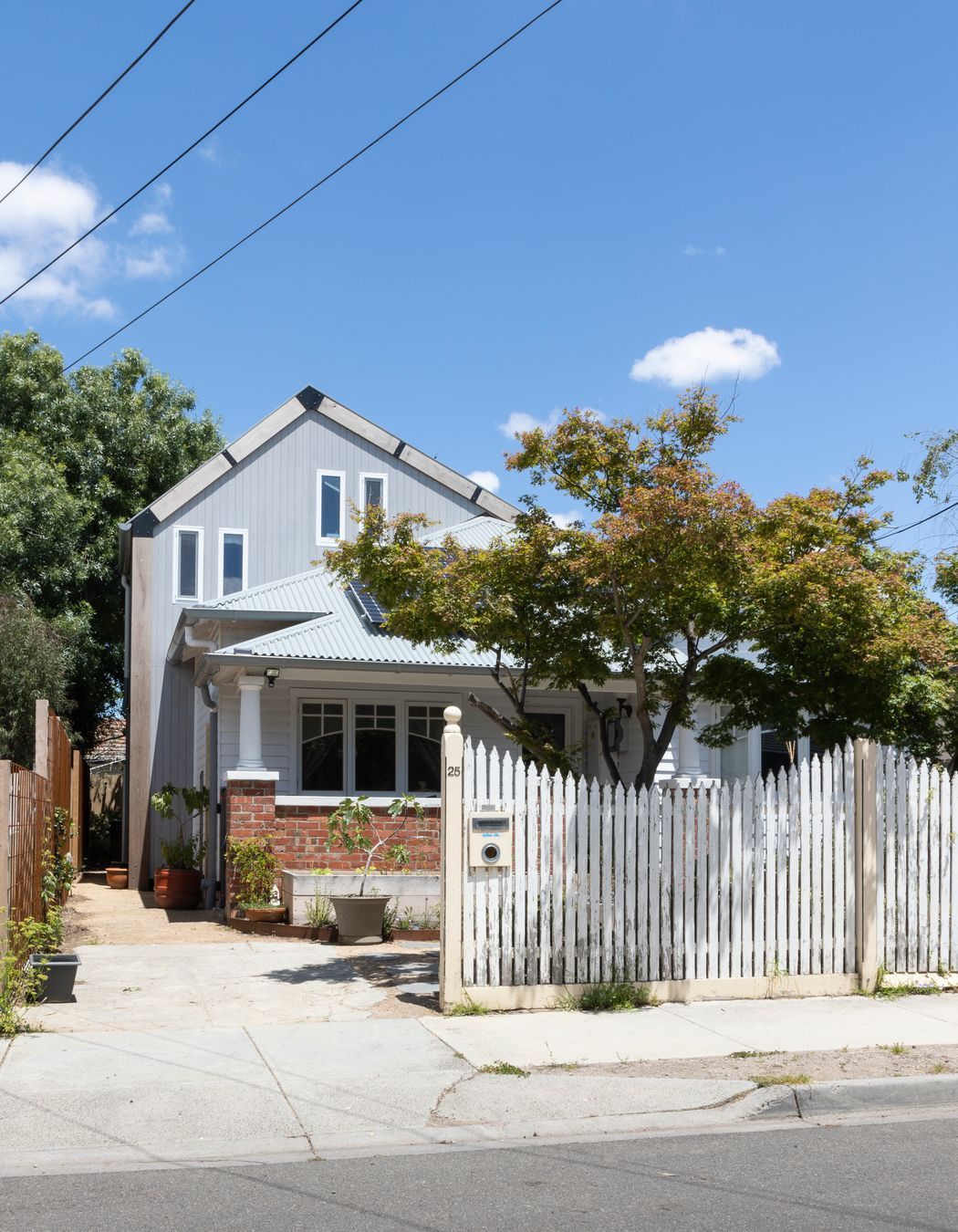 Street view, Thornbury renovation. The addition seamlessly blends into the original facade of the Edwardian cottage