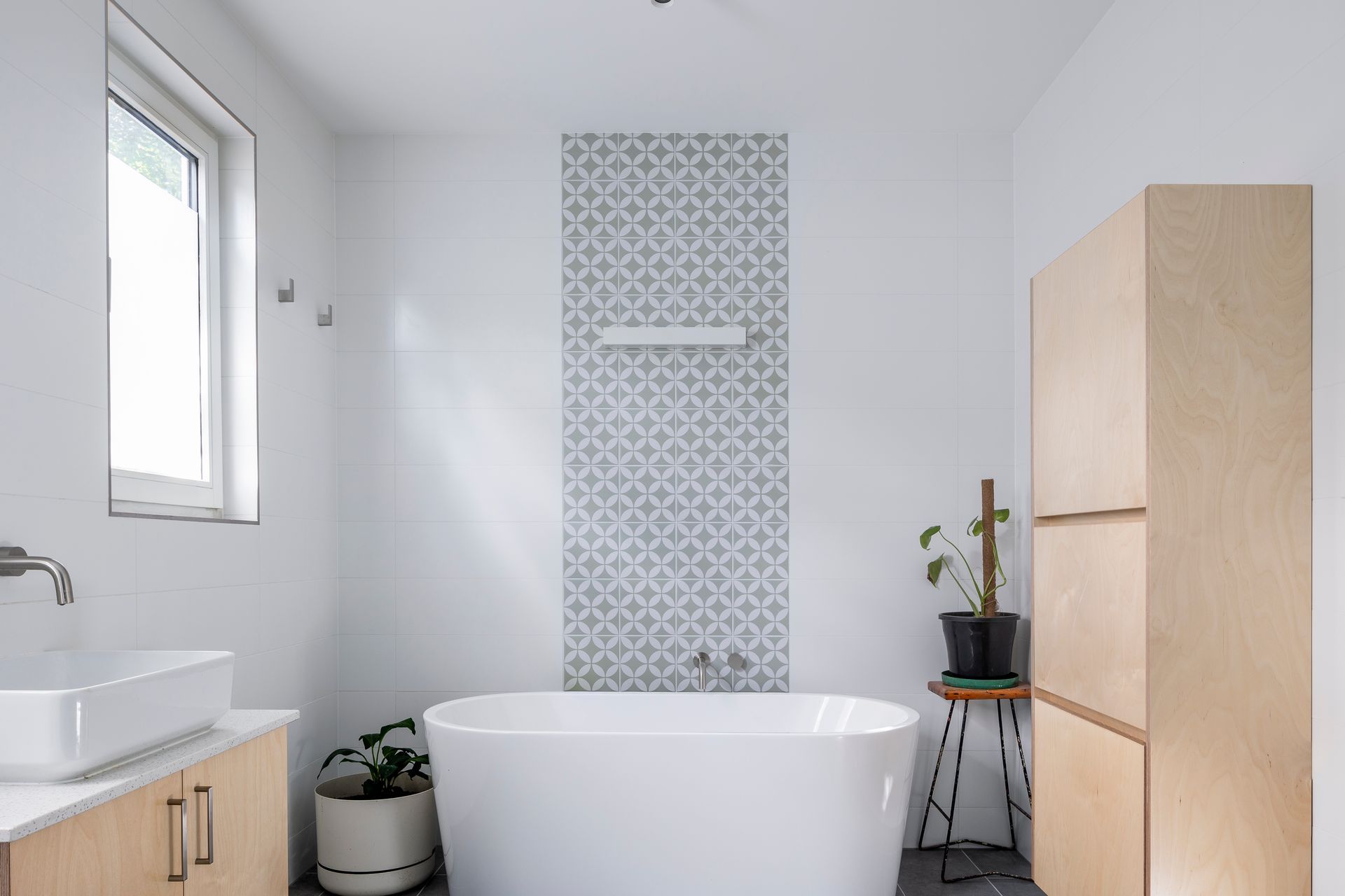 Frosted window provides privacy and bright light for the bathroom.