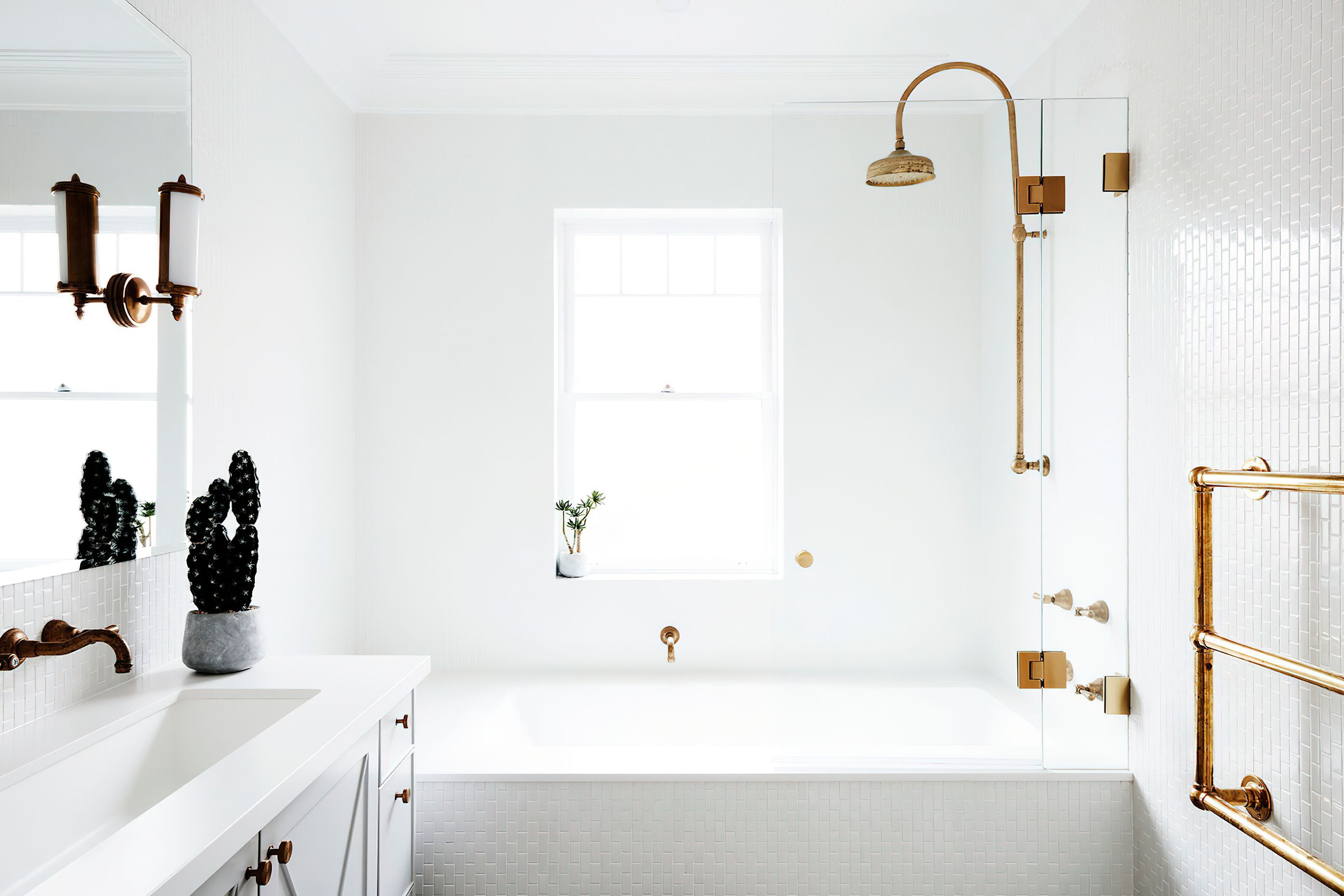 WHITE BATHROOM WITH CHROME HIGHLIGHTS - This spacious, white bathroom was entirely renovated and is mostly used by the children in the family. The chrome theme that is played out through the home is featured in the tapware.