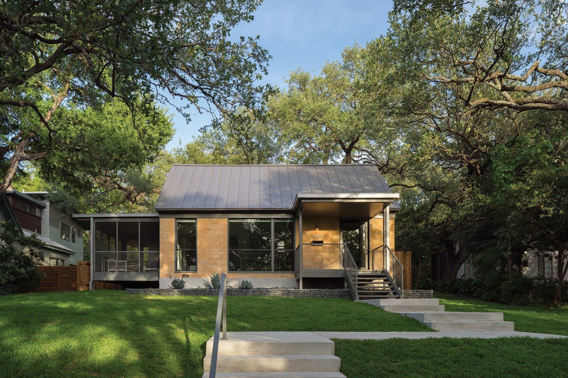 2LittleStacyParkCuppettKilpatrickArchitectureandInteriorDesignaustin-tx-residence-modern-natural-brick-metal-roof.jpg