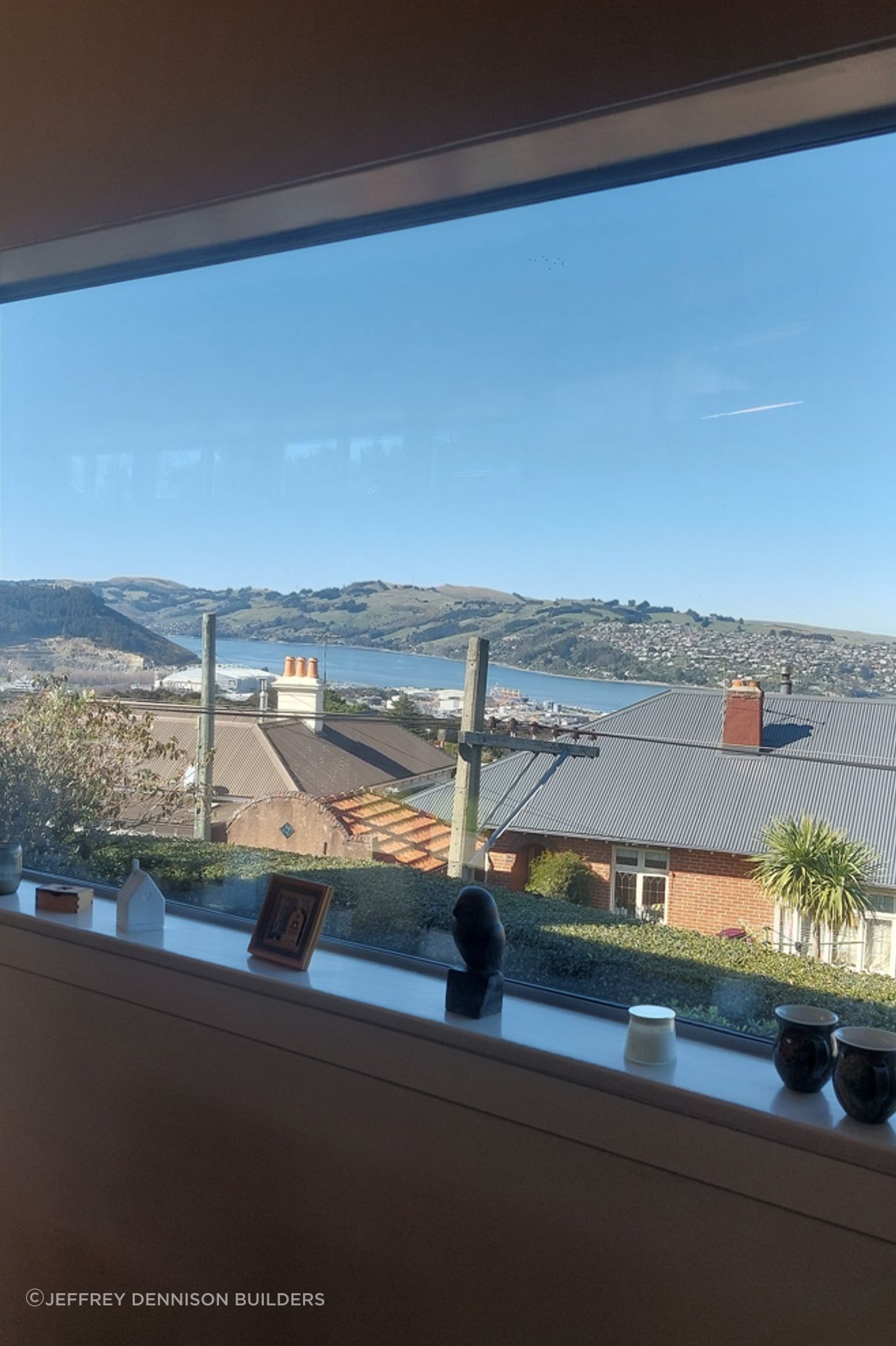 3-19-Tweed-St-Roslyn-Dunedin-Completion-of-interior-of-newly-installed-double-glazed-window-in-the-loungeroom-JDBuilders.jpg