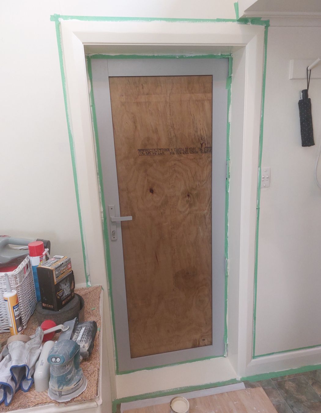 5-19-Tweed-St-Roslyn-Dunedin-Interior-showing-newly-installed-back-door-being-painted-double-glazing-to-be-installed-in-the-next-few-days-JDBuilders.jpg