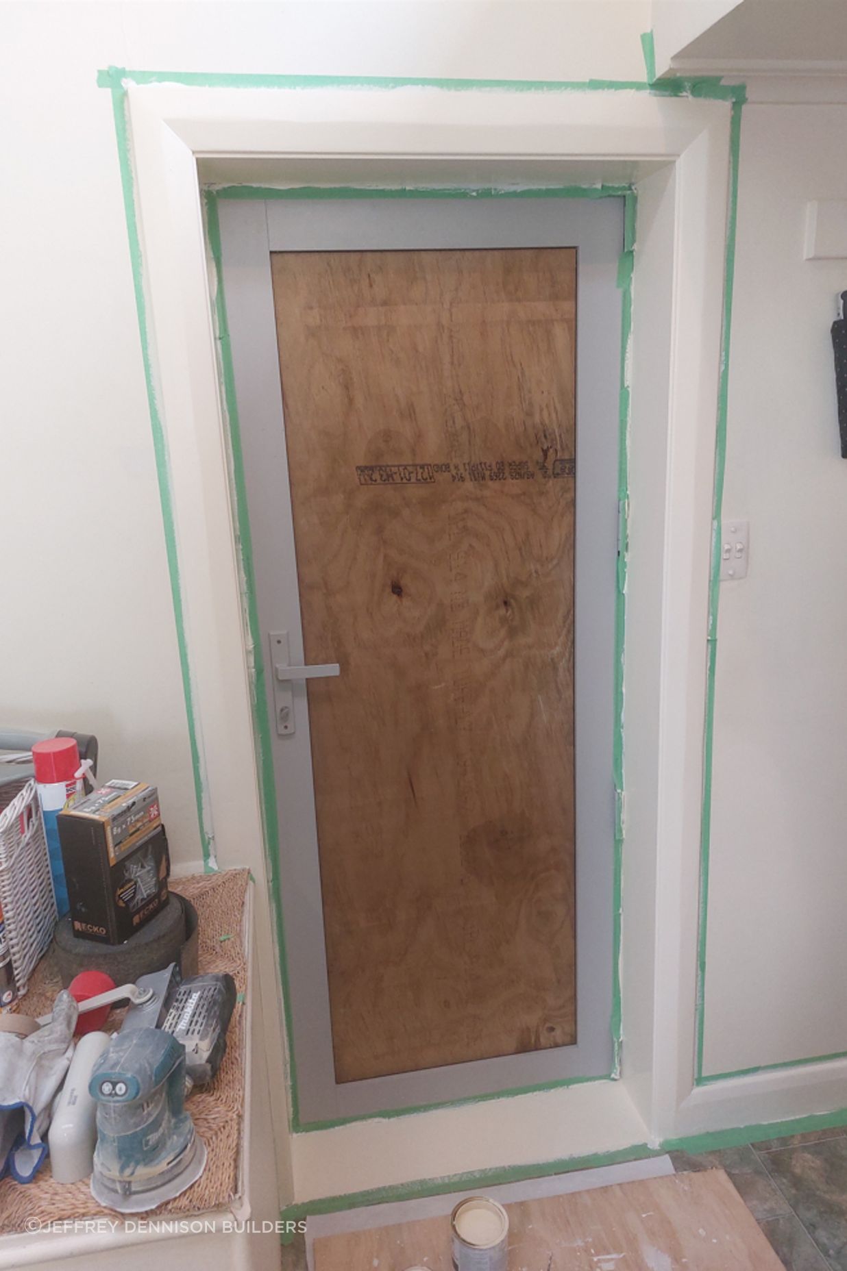 5-19-Tweed-St-Roslyn-Dunedin-Interior-showing-newly-installed-back-door-being-painted-double-glazing-to-be-installed-in-the-next-few-days-JDBuilders.jpg