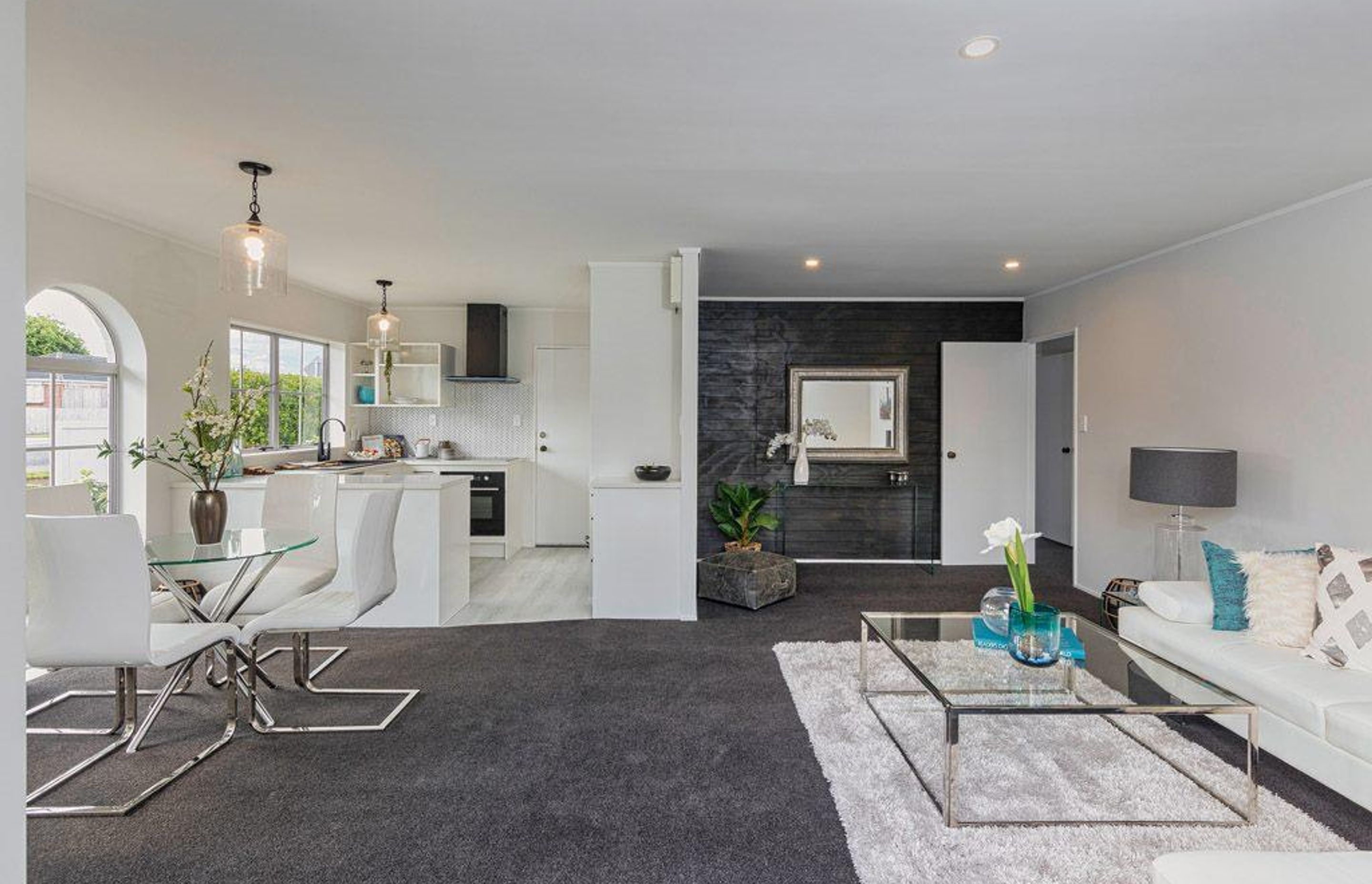 Living Room - Check out the timber panelling on the back wall... Wow!
