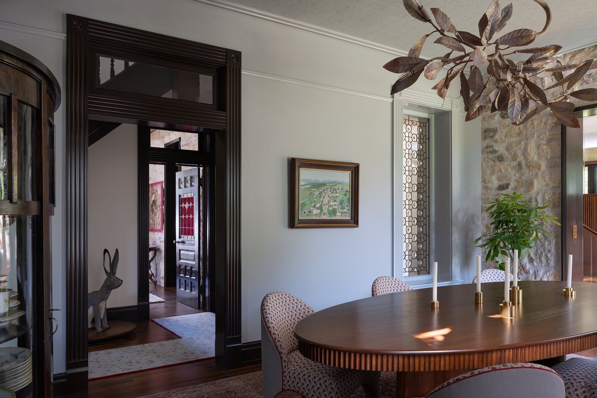 5PastandPresentPlaceCuppettKilpatrickArchitectureandInteriorDesignAustinTexashistoric-renovation-dining-room-interior-design-transom-leaded-glass.jpg