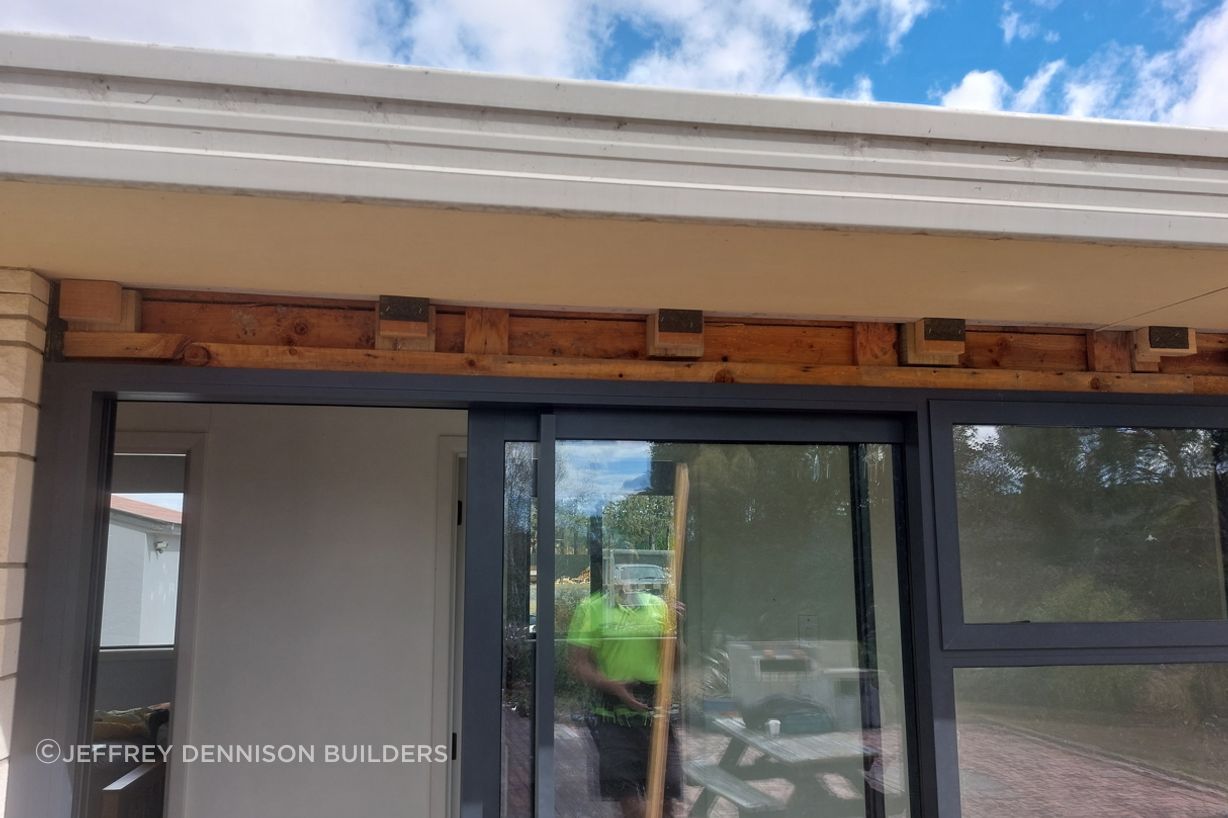 6-195-Galbraith-Rd-Flagswamp-Installing-the-new-sliding-door-for-the-hallway-JDBuilders.jpg