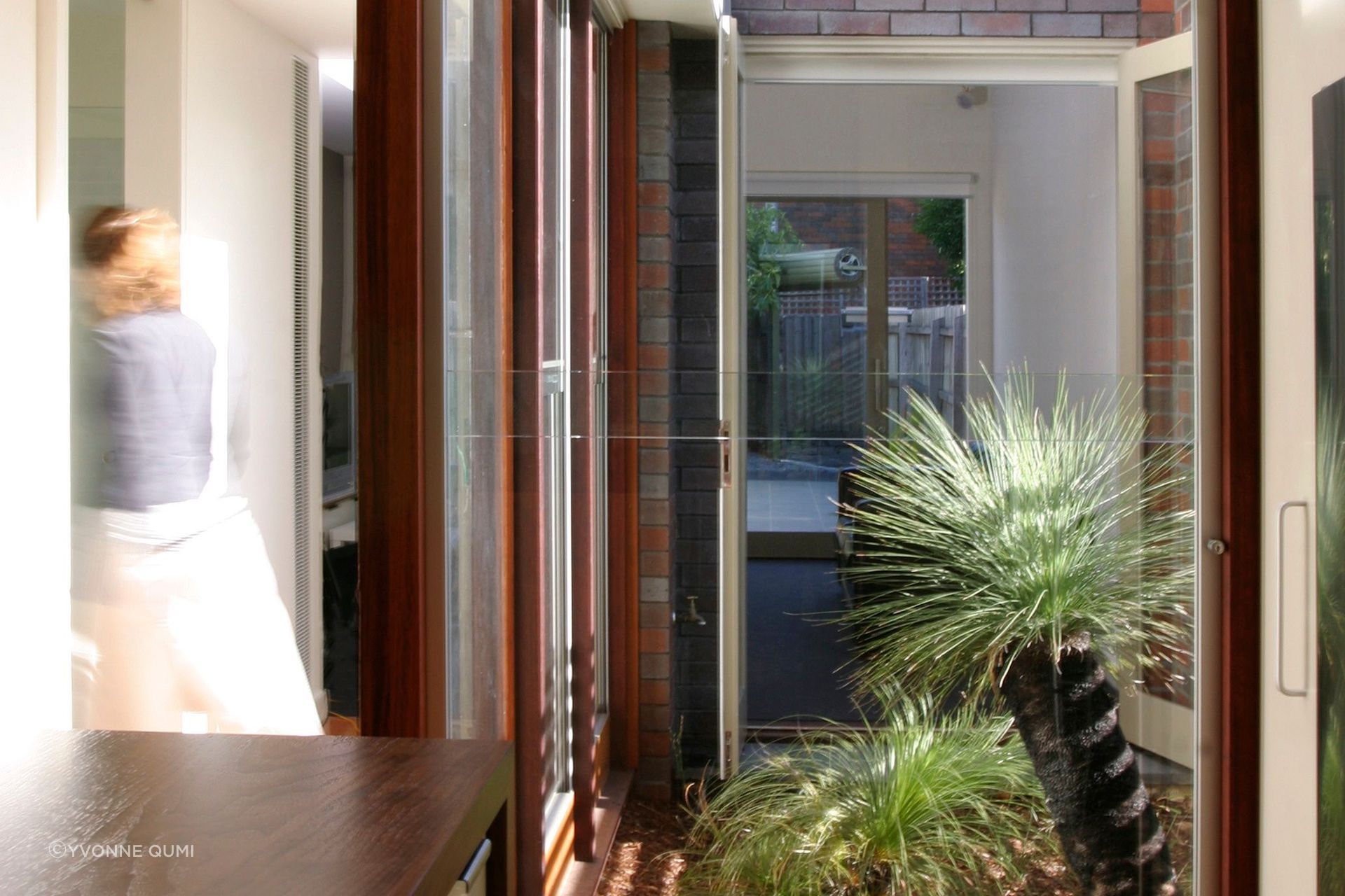 An internal courtyard floods the interior space with light