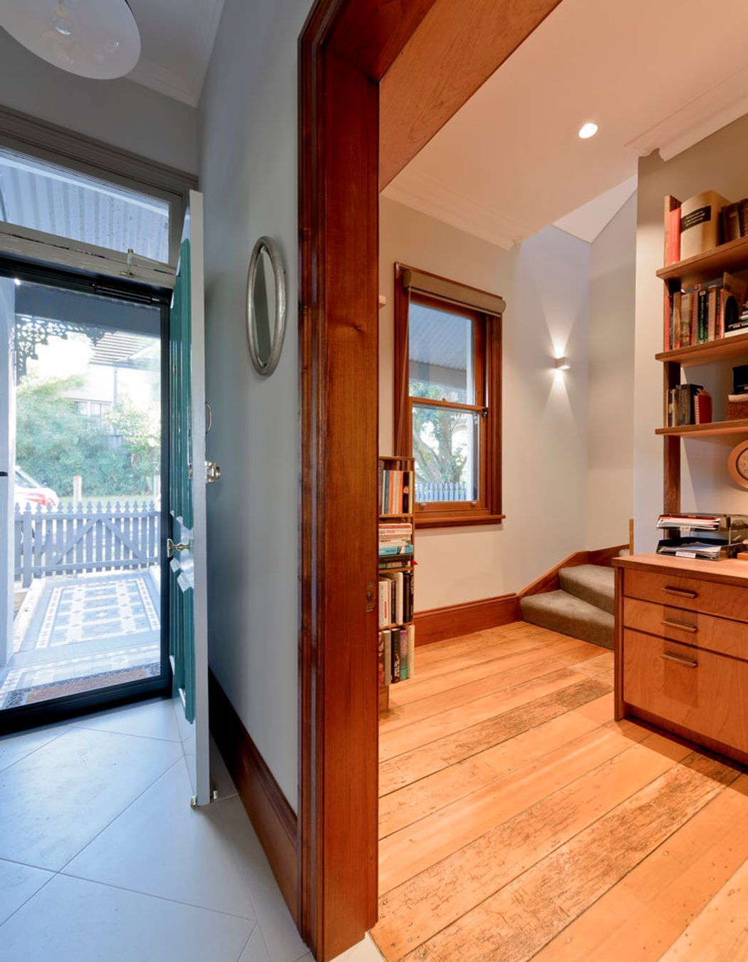 Traditional NG Rosewood moldings & restored Kauri floorboards with Black Bean feature joinery