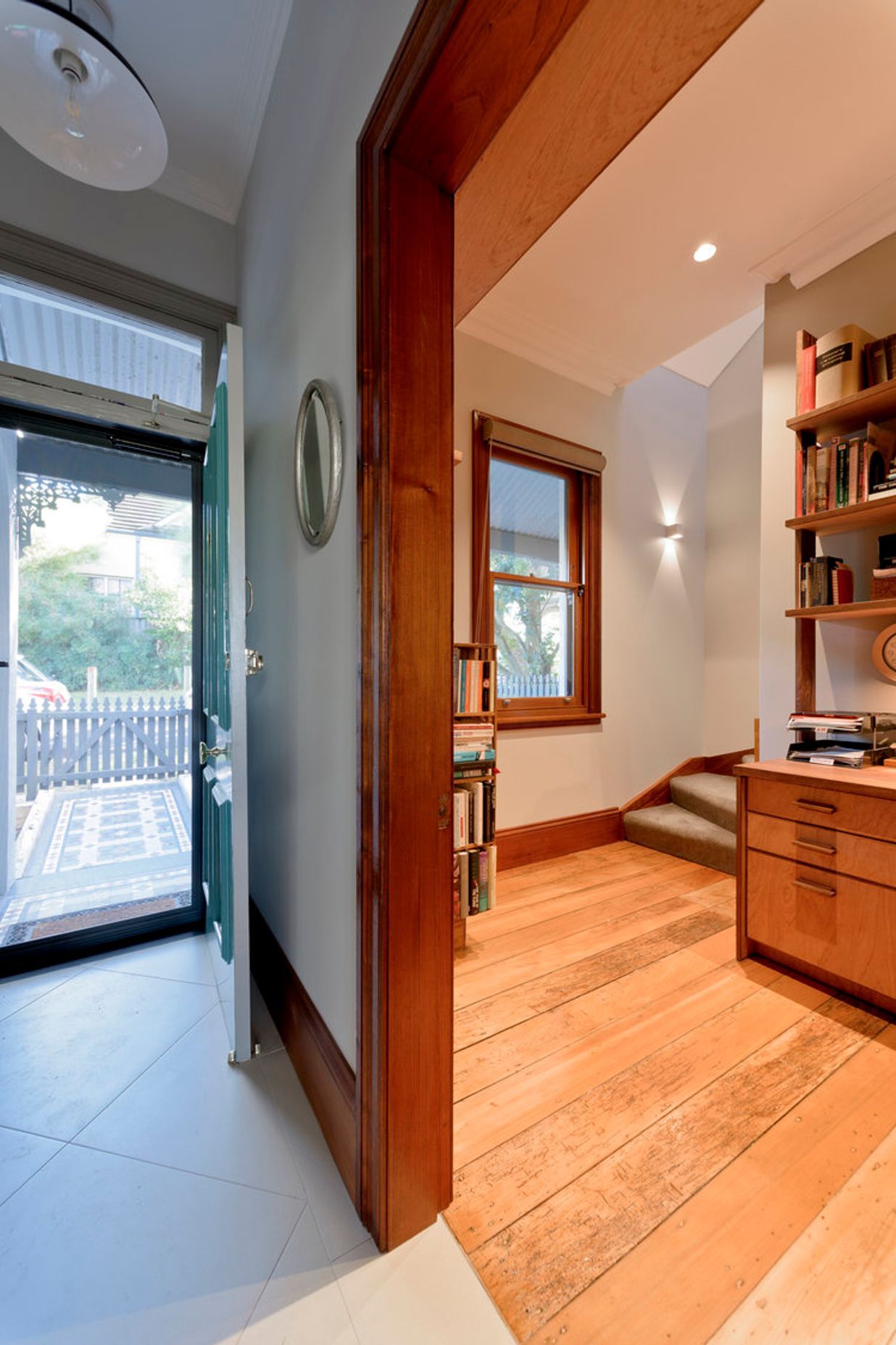Traditional NG Rosewood moldings & restored Kauri floorboards with Black Bean feature joinery